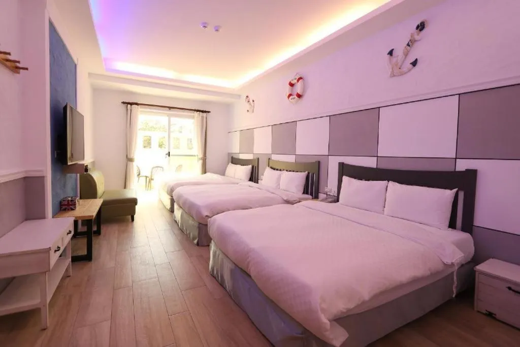 Photo of the whole room, Bed in Island on the Sea