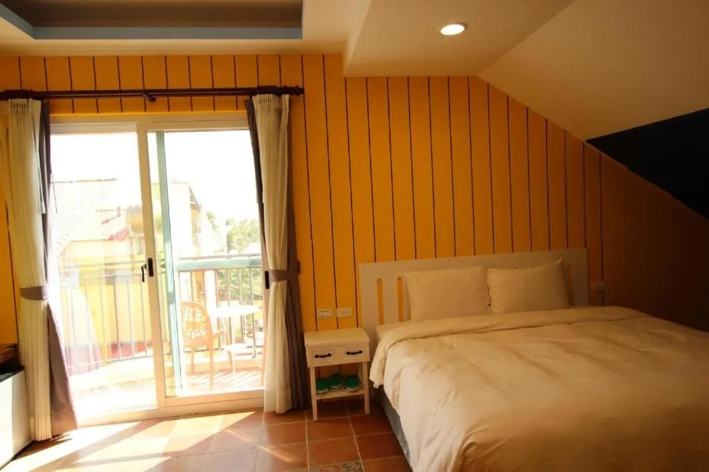 Photo of the whole room, Bed in Island on the Sea