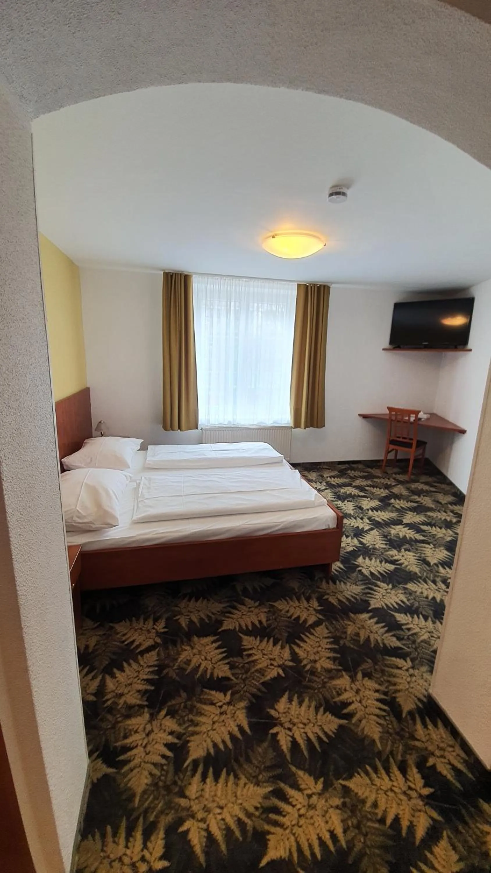 Bed in Hotel Der Tannenbaum