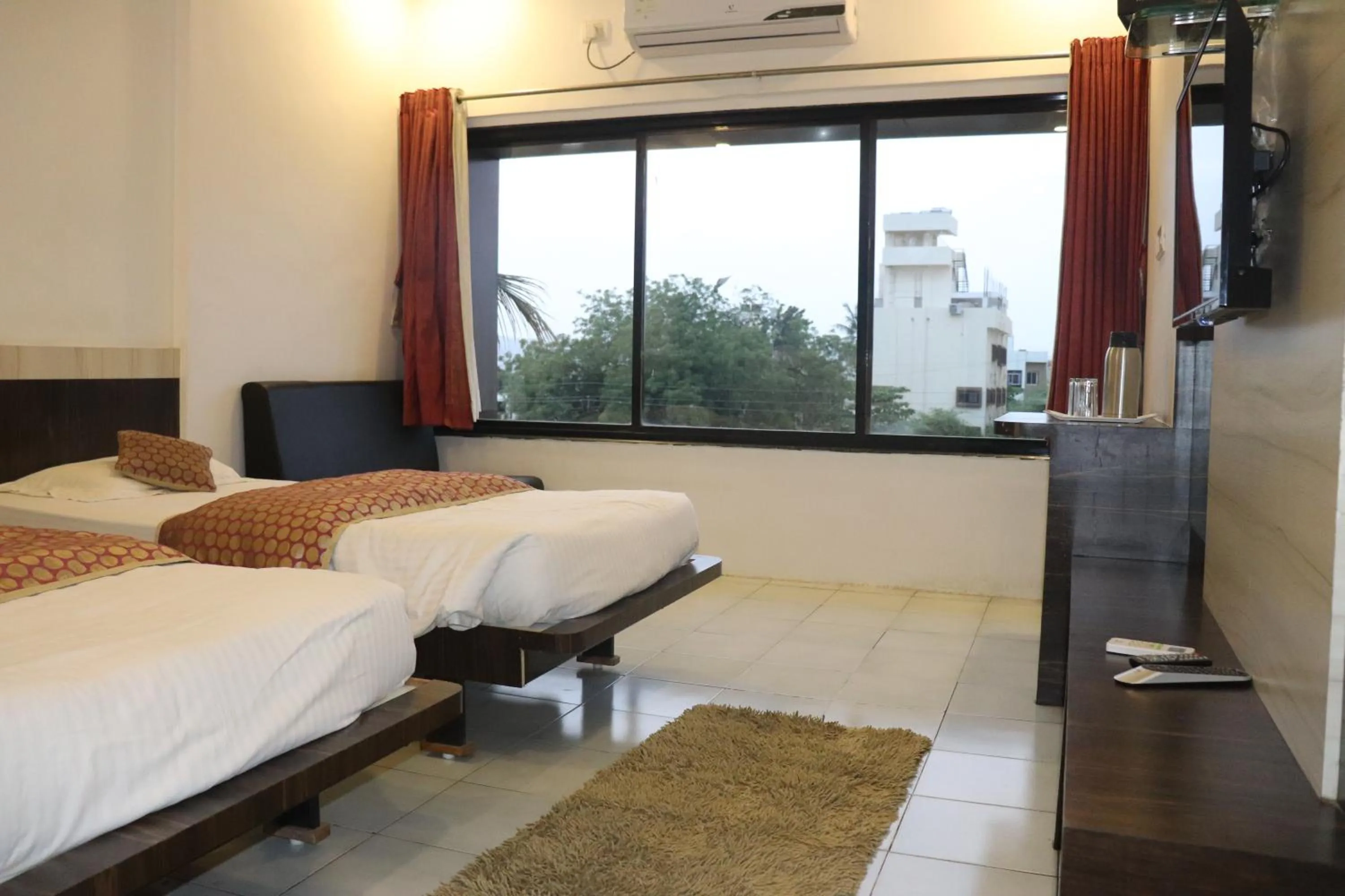 Photo of the whole room, Bed in Hotel Raj