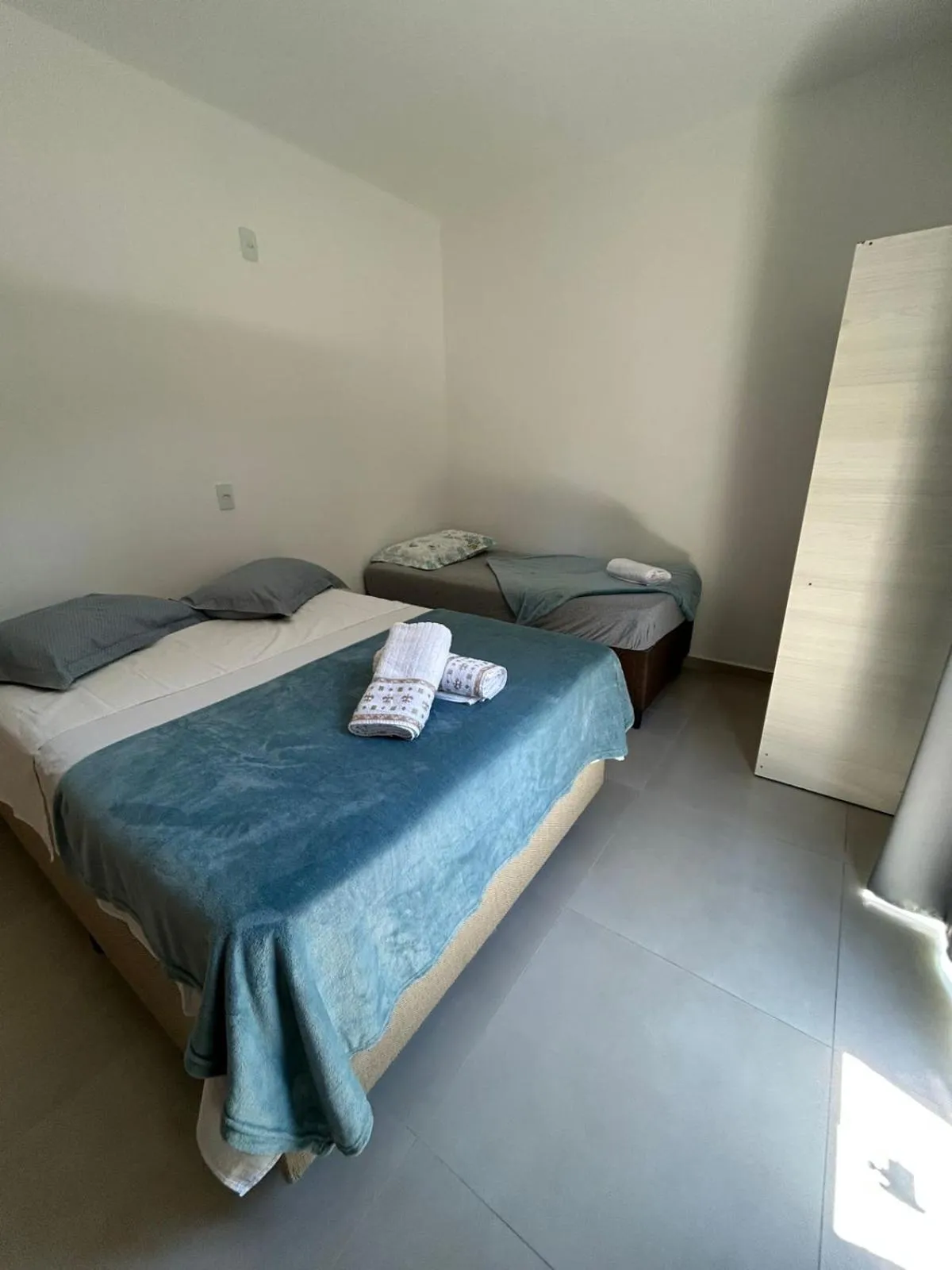 Bed in Pousada casa da amizade