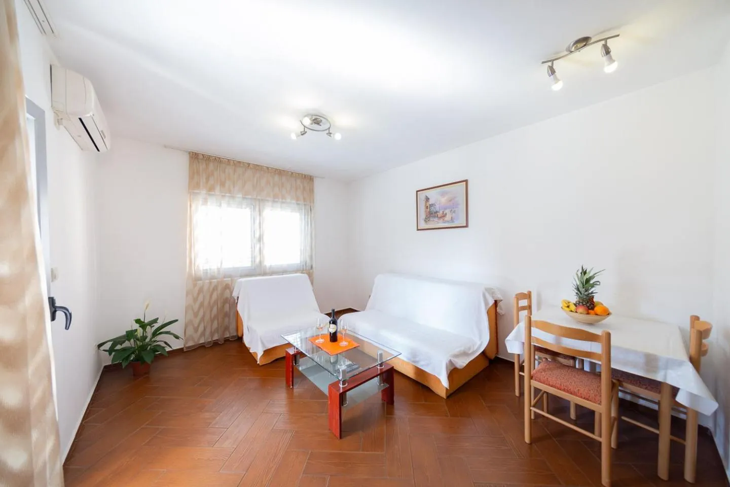 Living room, Bed in SMS Apartments