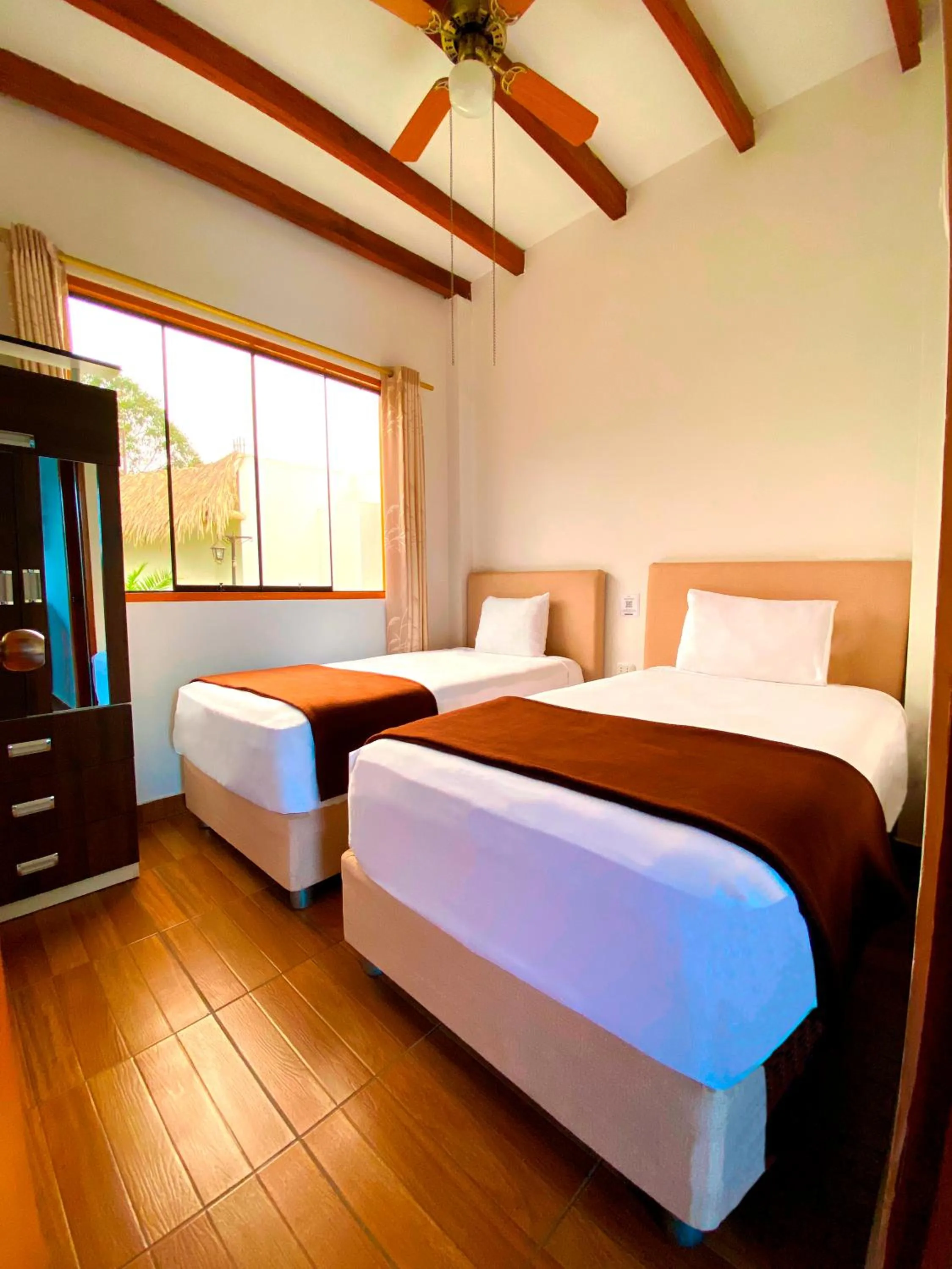 Bed in Hotel Resort Thiago