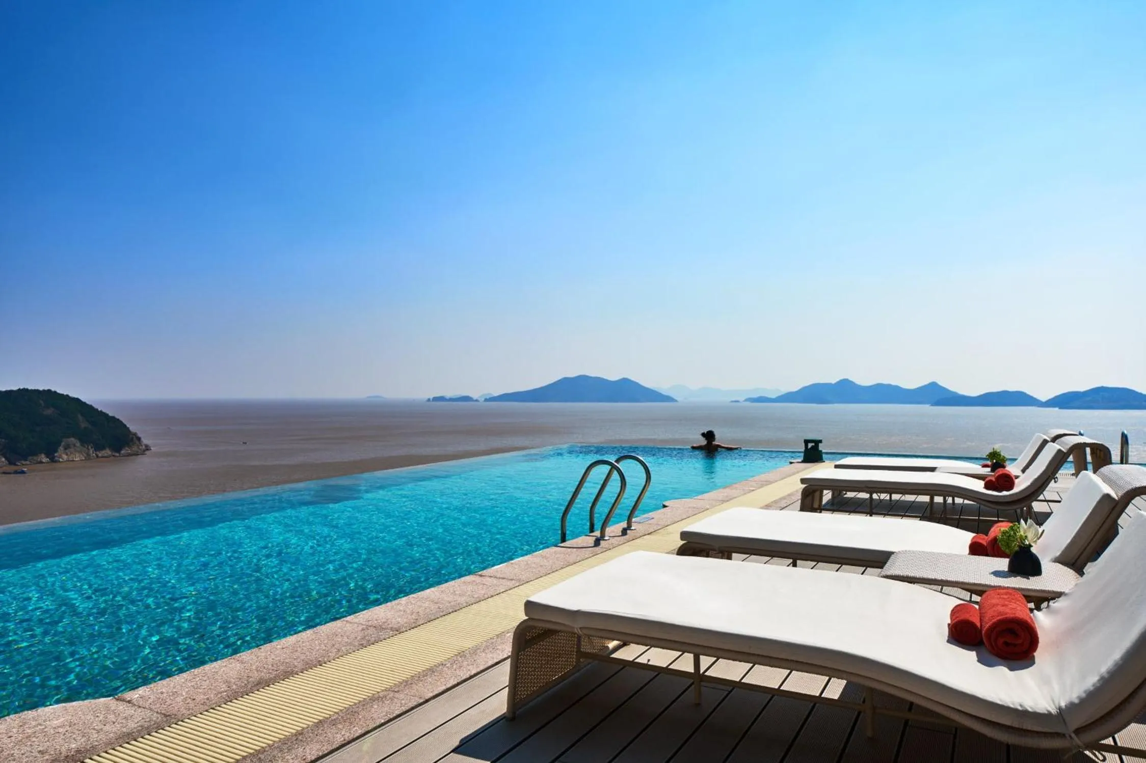 Swimming pool in Crowne Plaza Ningbo Xiangshan Sea View by IHG