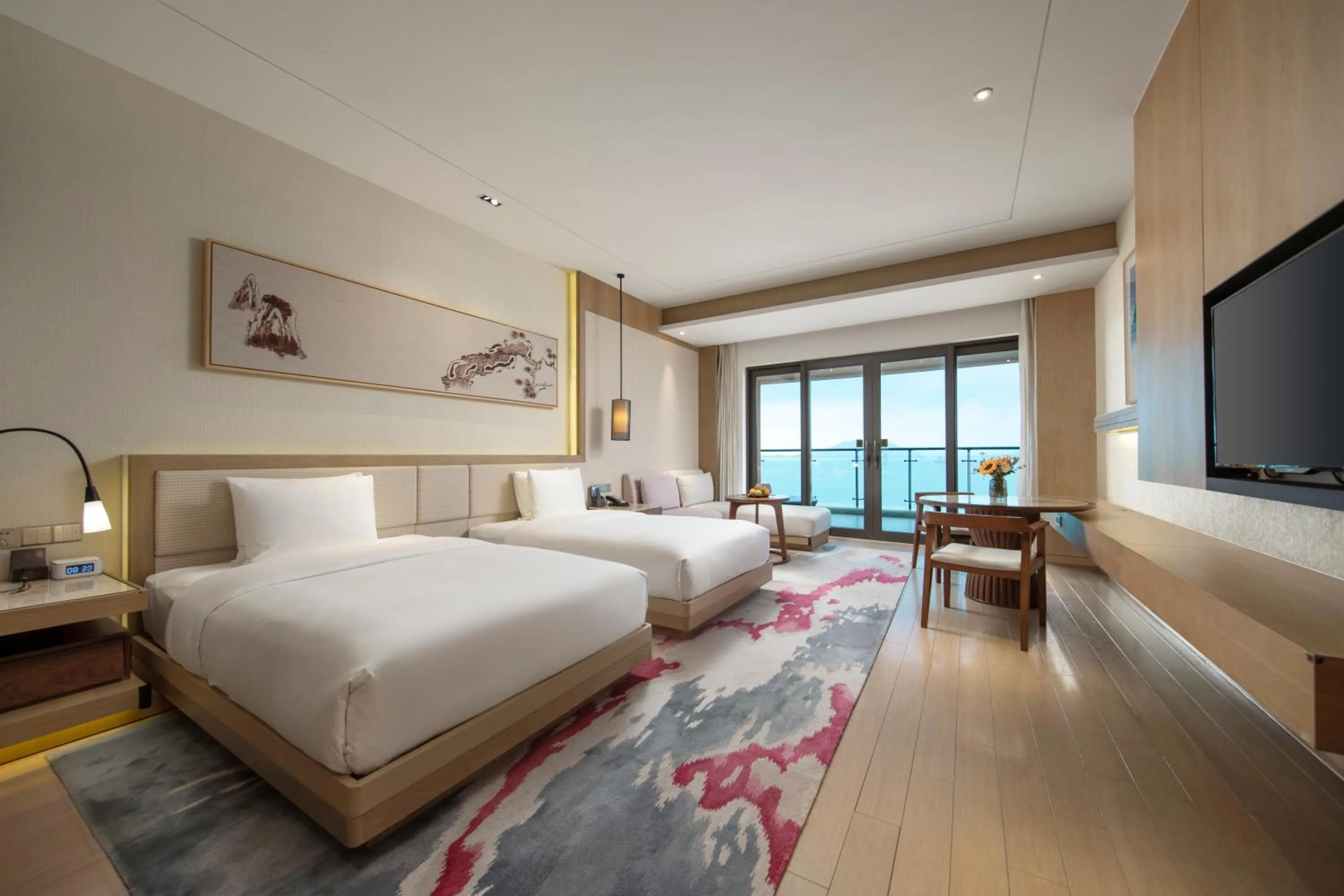 Bed in Crowne Plaza Ningbo Xiangshan Sea View by IHG