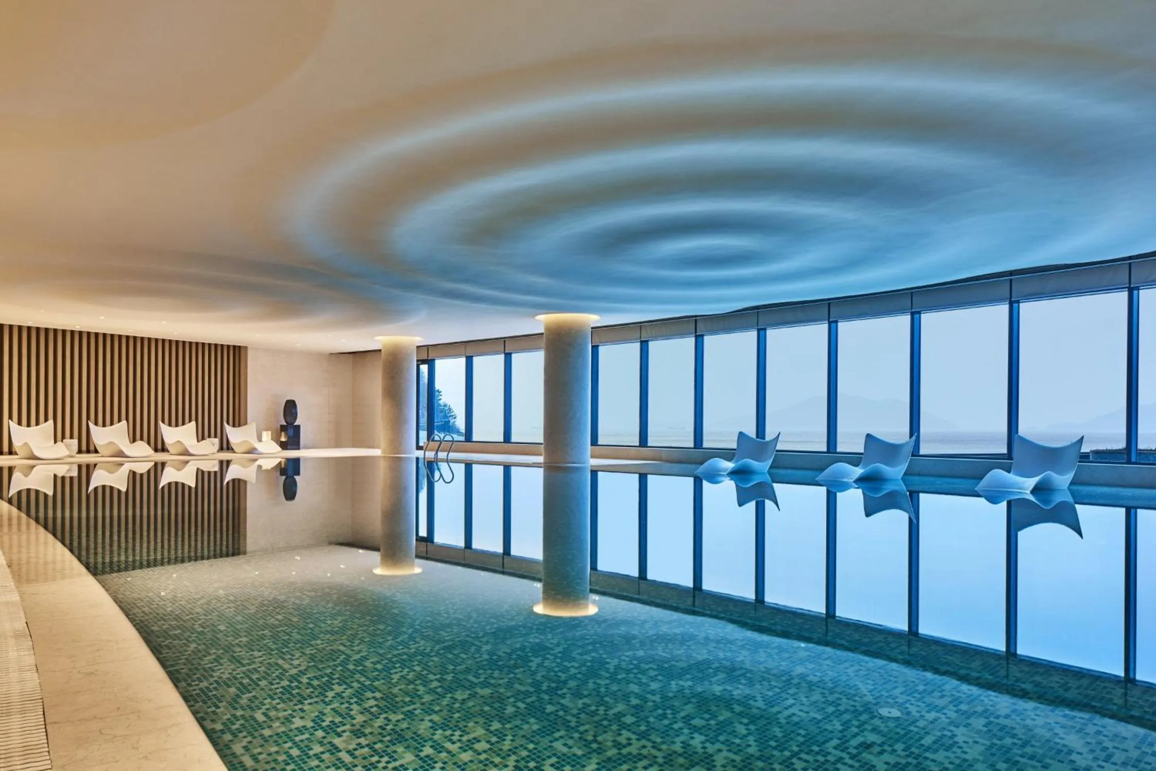 Swimming pool in Crowne Plaza Ningbo Xiangshan Sea View by IHG