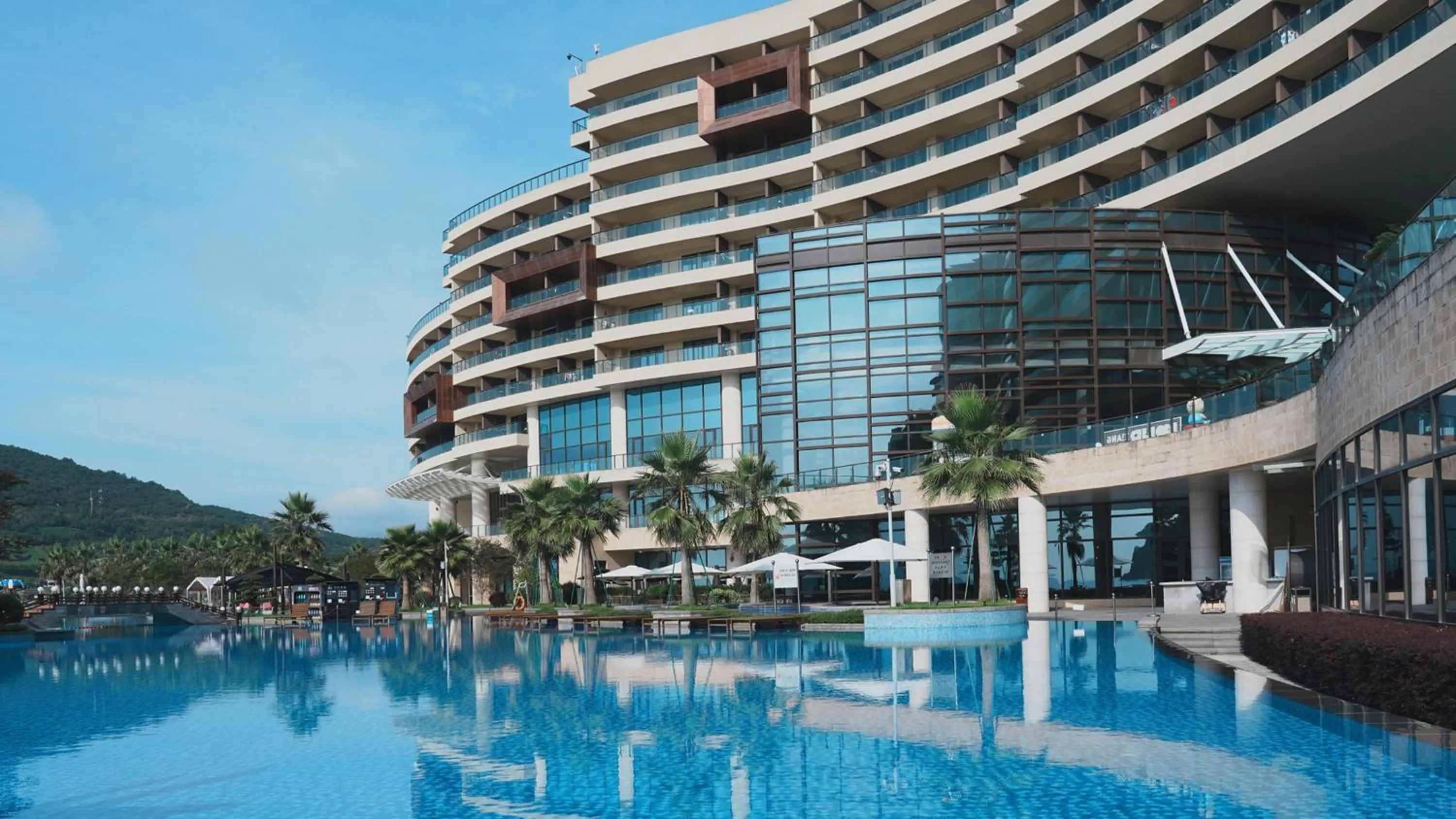 Swimming pool in Crowne Plaza Ningbo Xiangshan Sea View by IHG