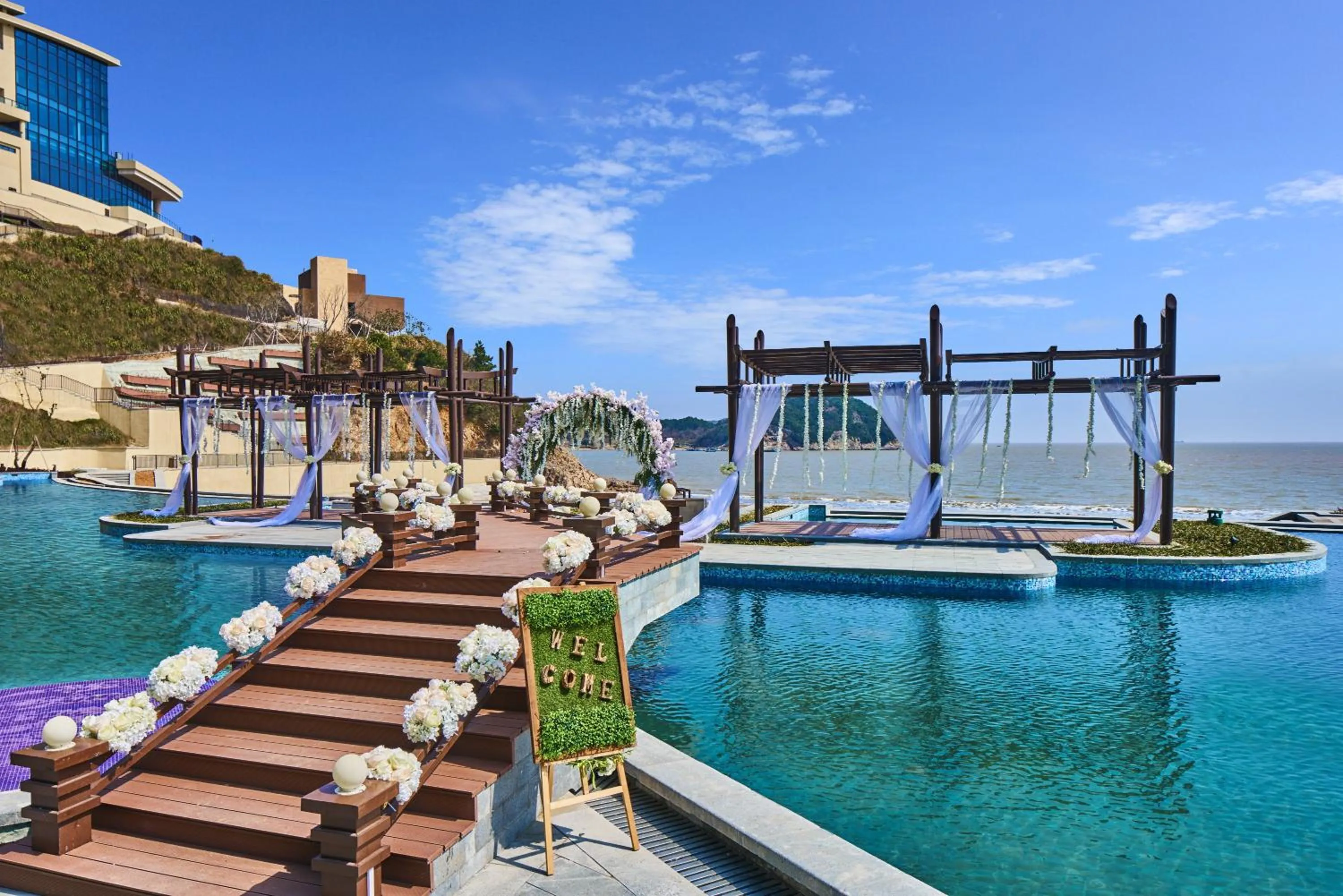 Swimming pool in Crowne Plaza Ningbo Xiangshan Sea View by IHG