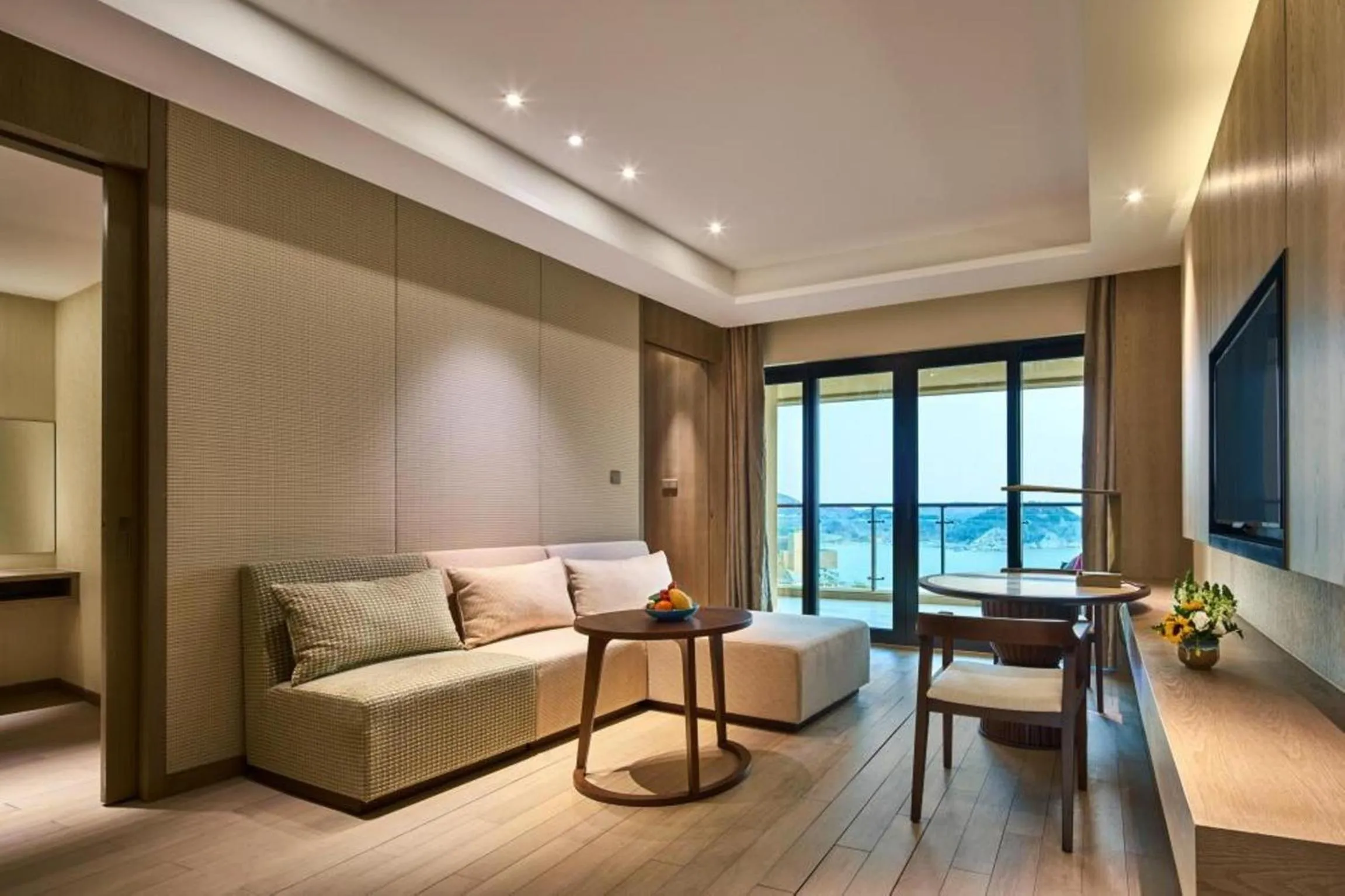 Living room in Crowne Plaza Ningbo Xiangshan Sea View by IHG
