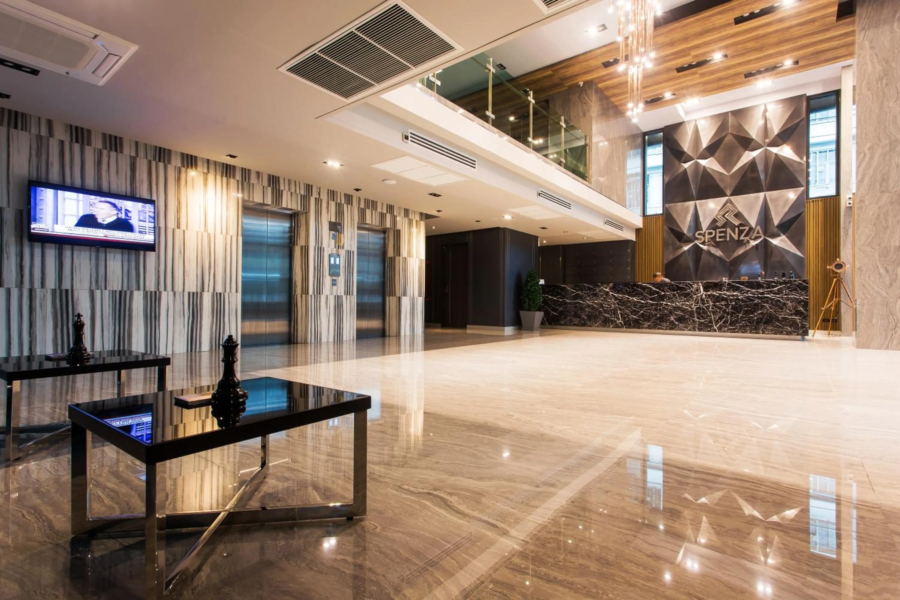 Lobby or reception in Spenza Hotel