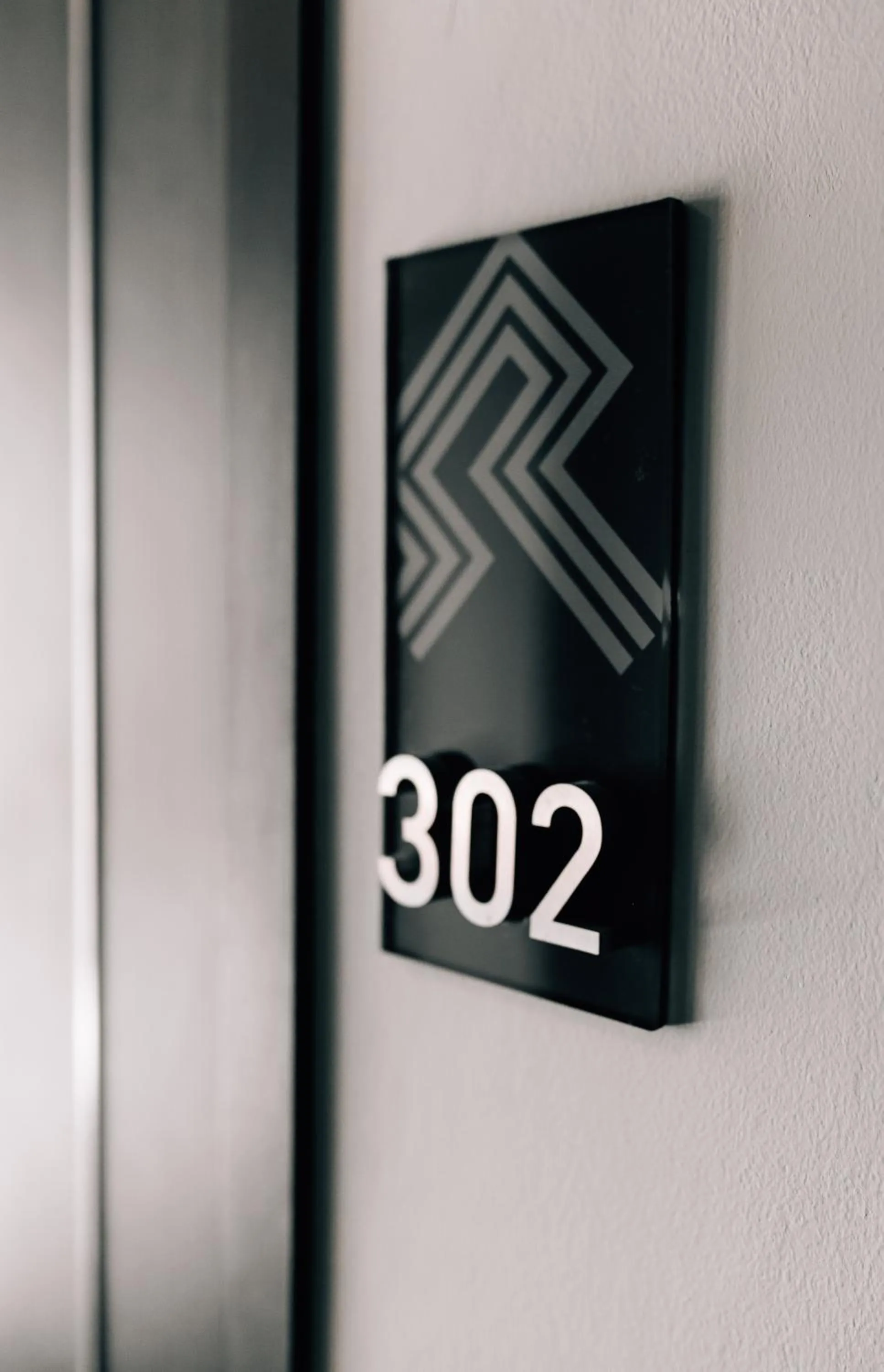 Property logo or sign in Spenza Hotel