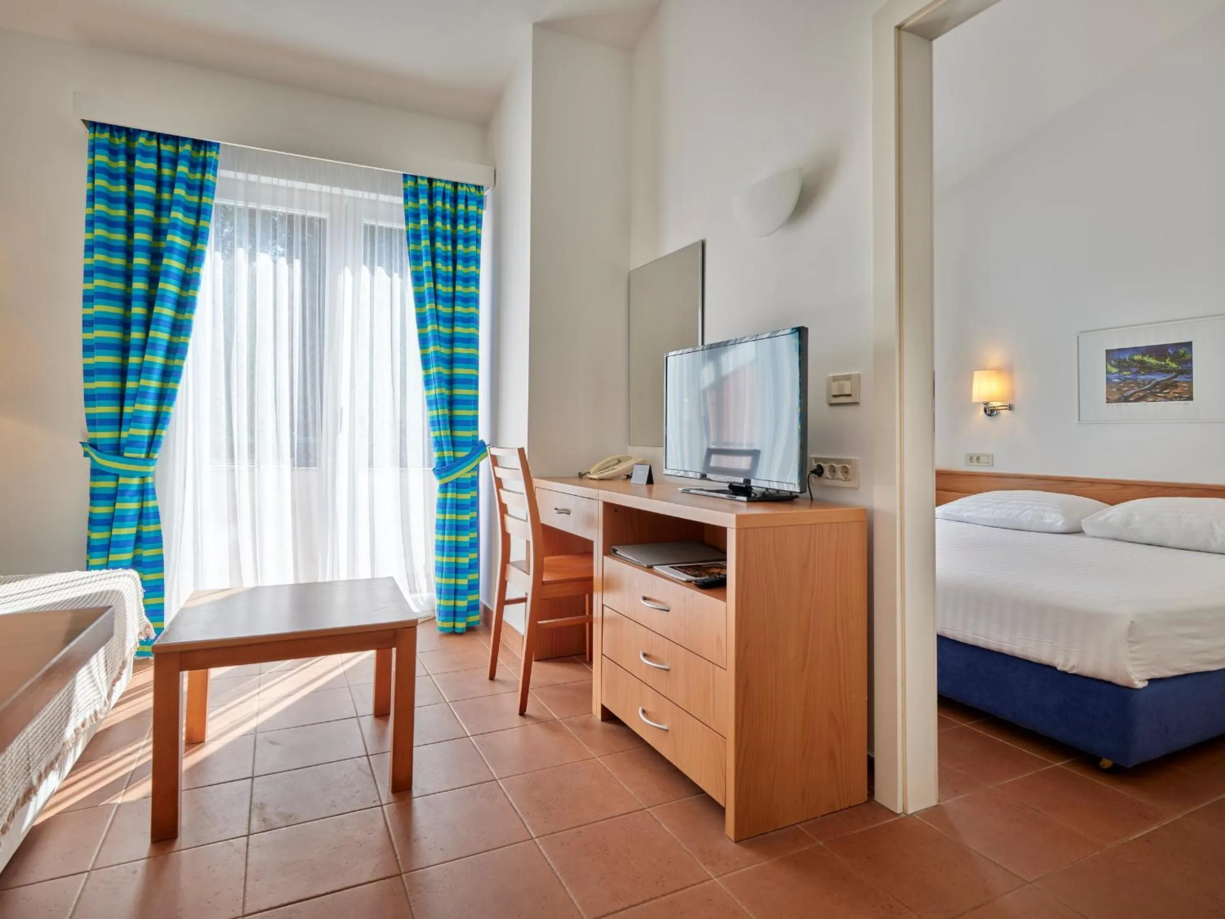 TV and multimedia, Bed in Koversada Apartments Naturist Park