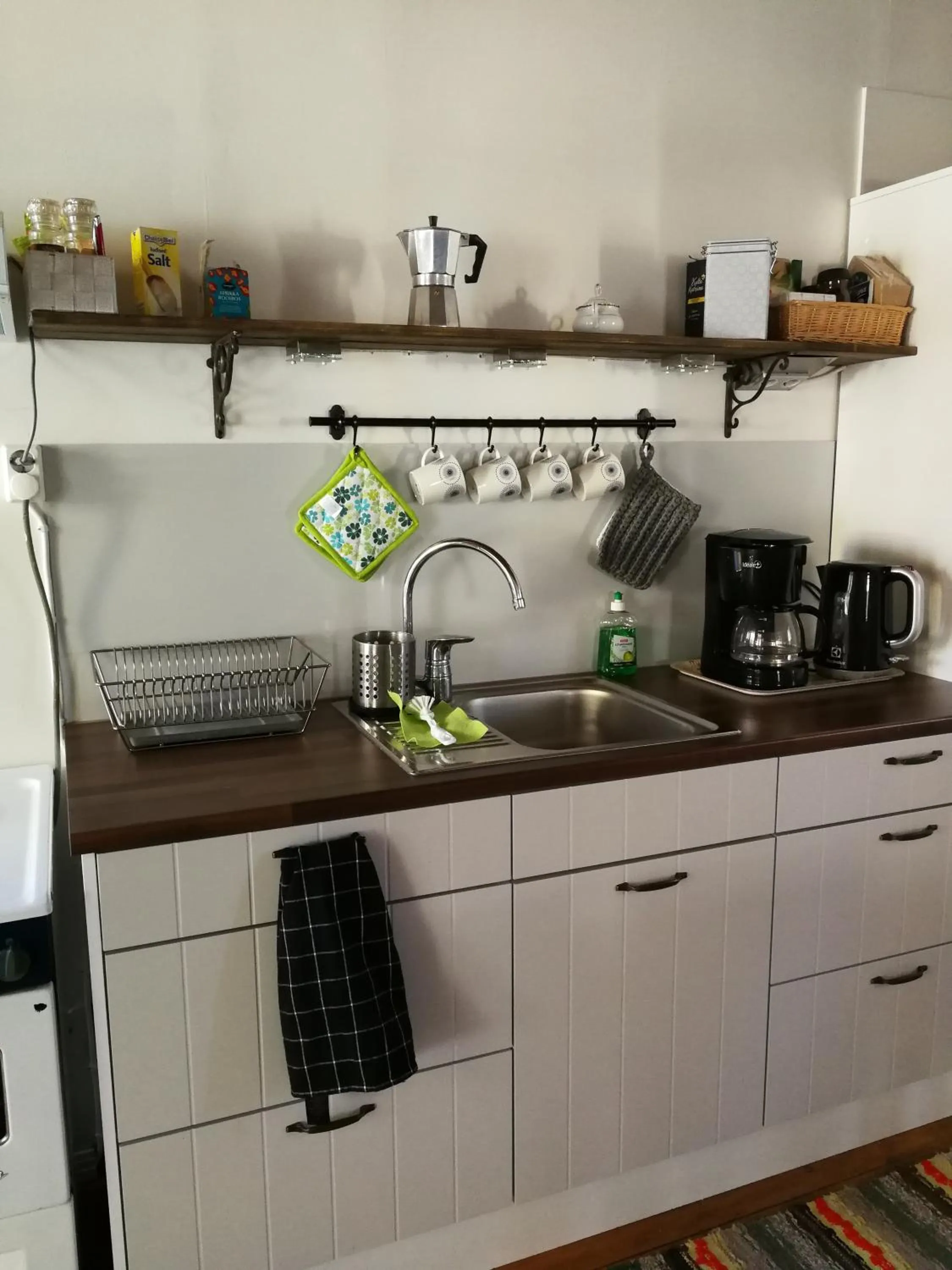 Kitchen or kitchenette in Kirkkokadun Amanda ja Olga