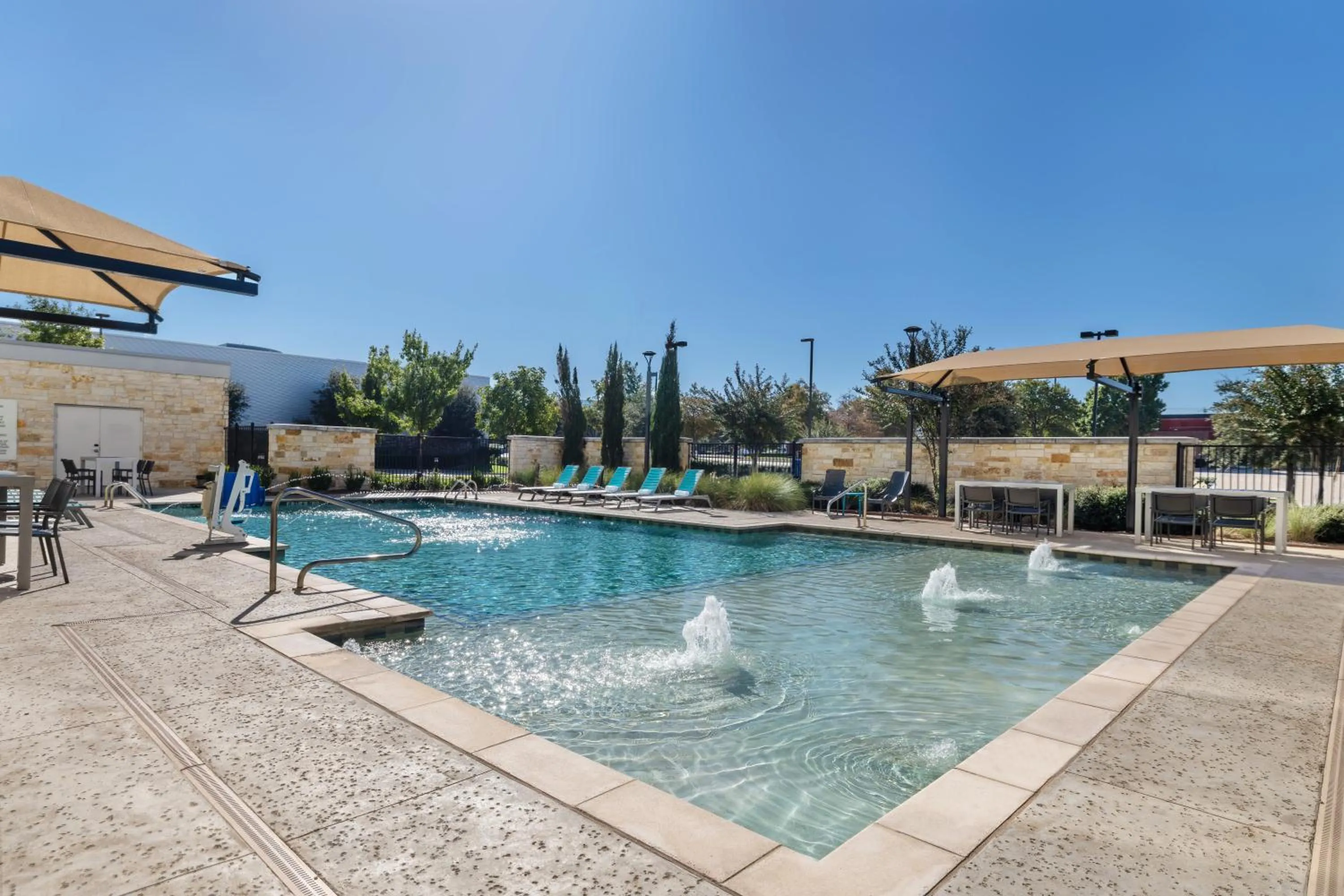 Swimming pool in Home2 Suites By Hilton Dallas Addison
