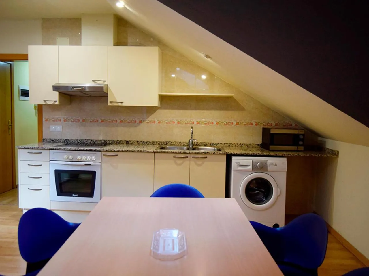 Kitchen or kitchenette in Apartamentos Pantebre 3000