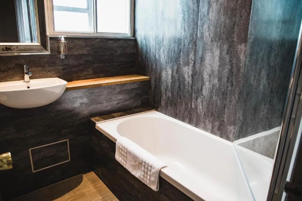 Bathroom in OYO The Red Lion Hotel