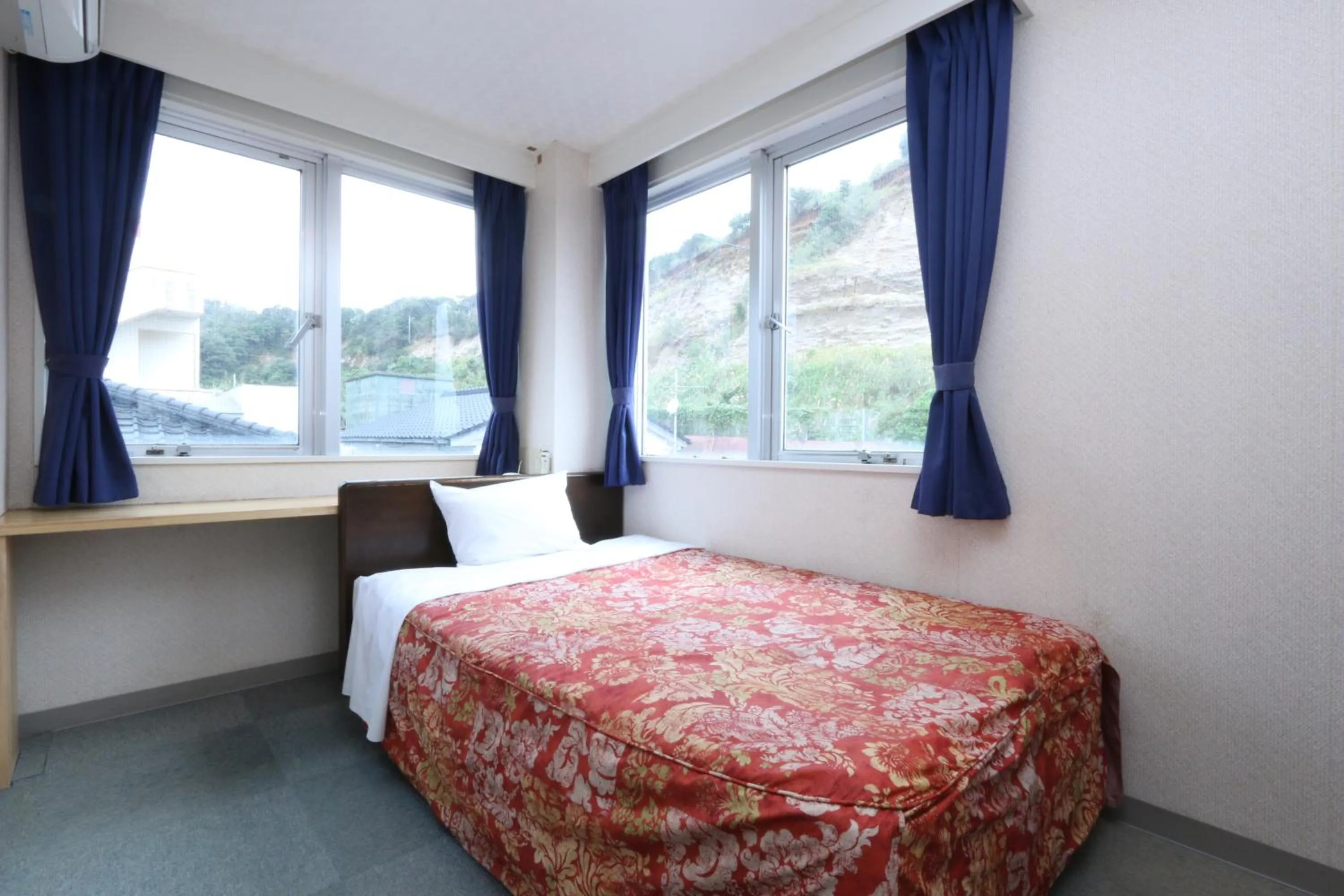 Bed in Hotel Auberge