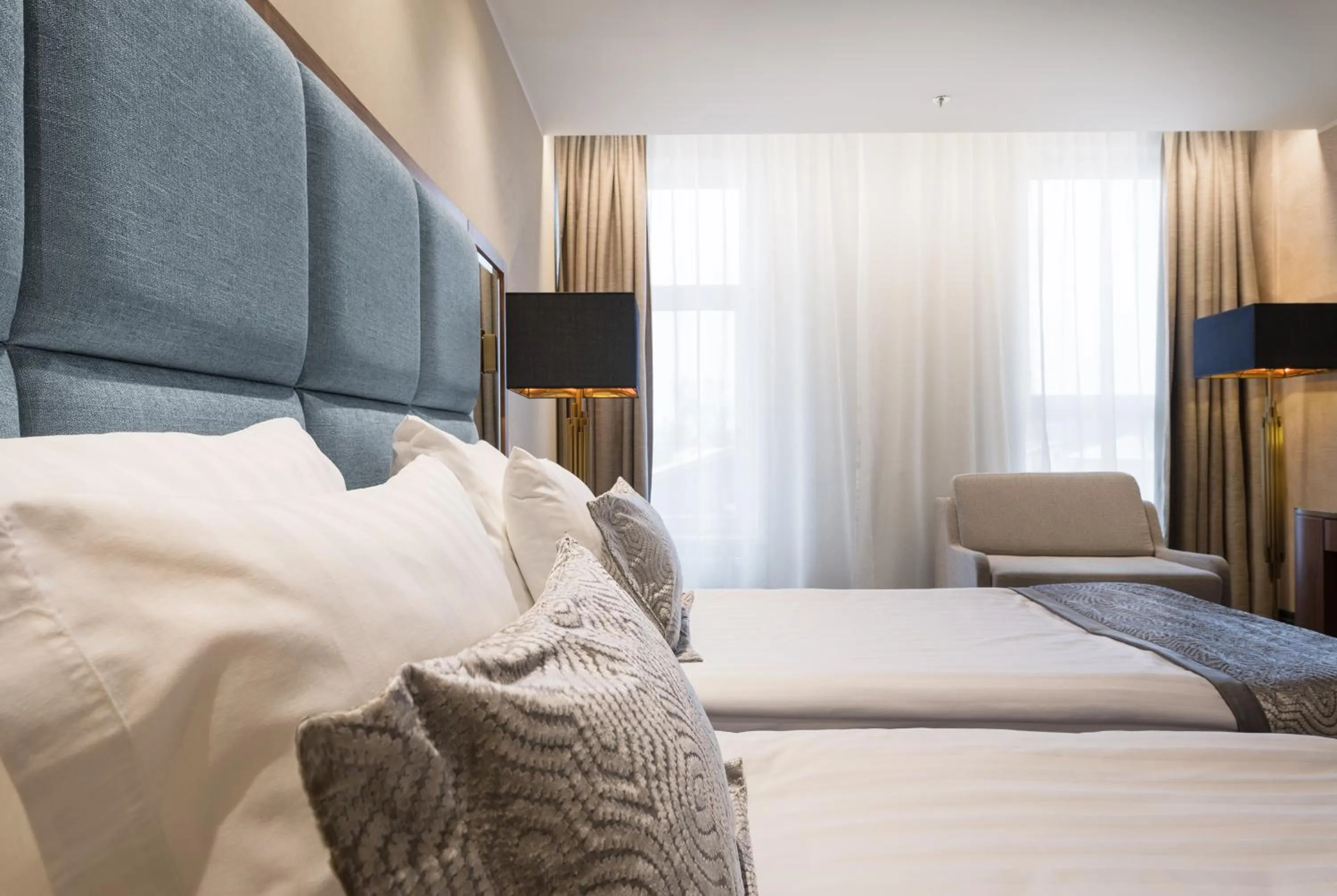 Bed in V Spa & Conference Hotel