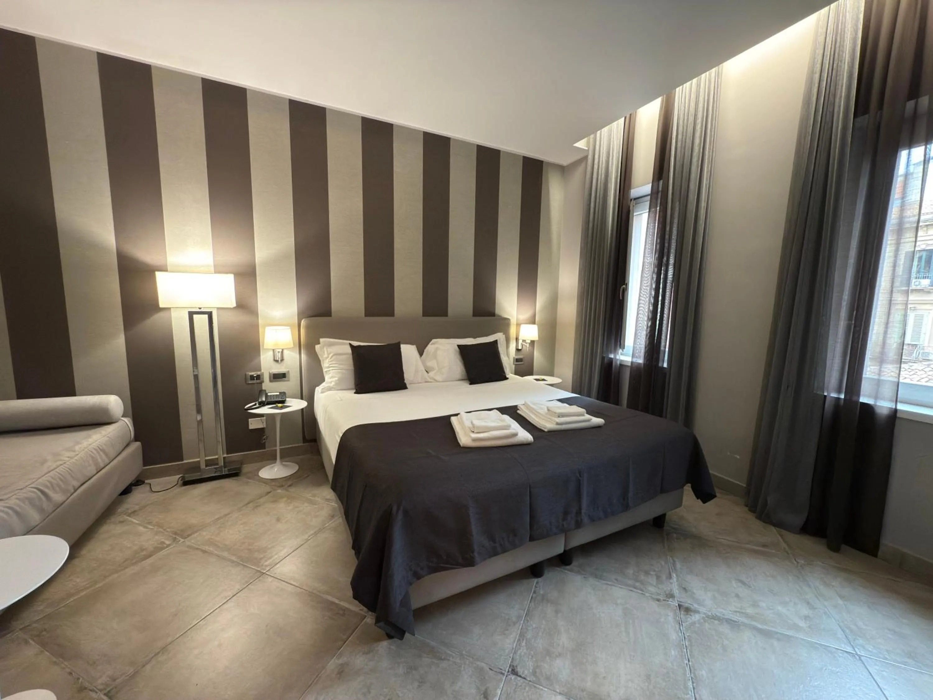 Bed in ETNEA 454 Catania Luxury Rooms