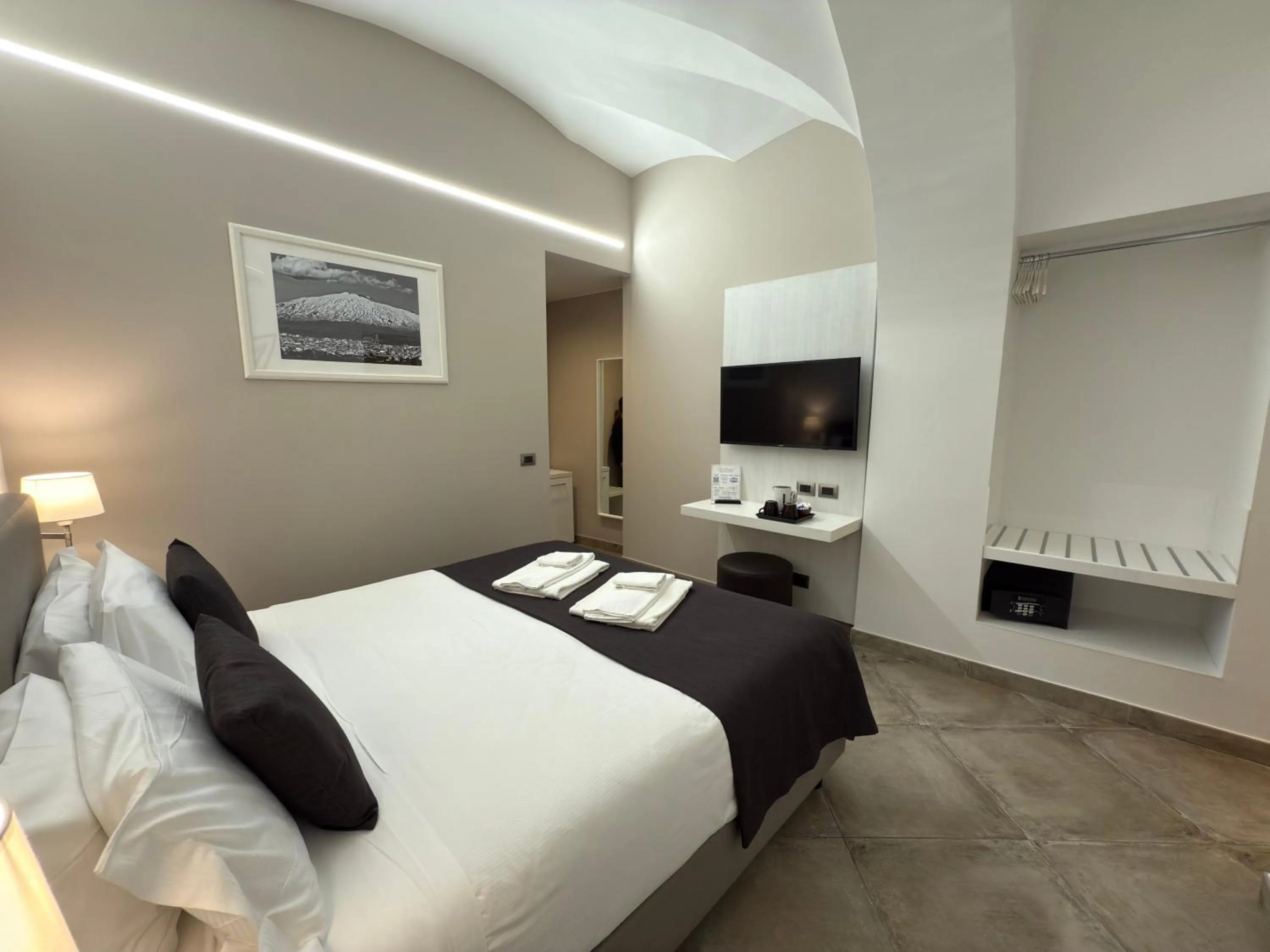 Bed in ETNEA 454 Catania Luxury Rooms