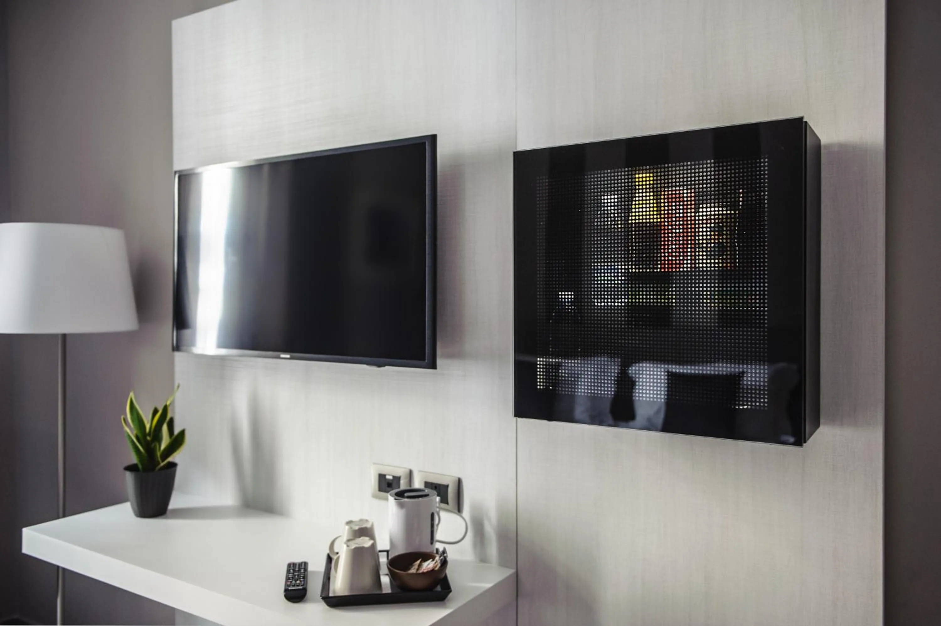 TV and multimedia in ETNEA 454 Catania Luxury Rooms