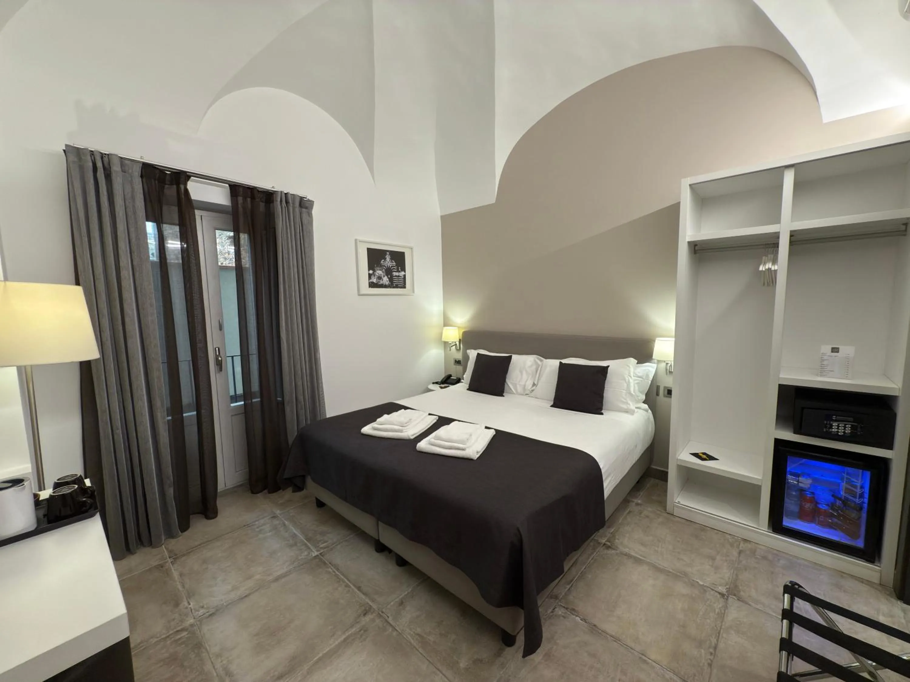 Bed in ETNEA 454 Catania Luxury Rooms