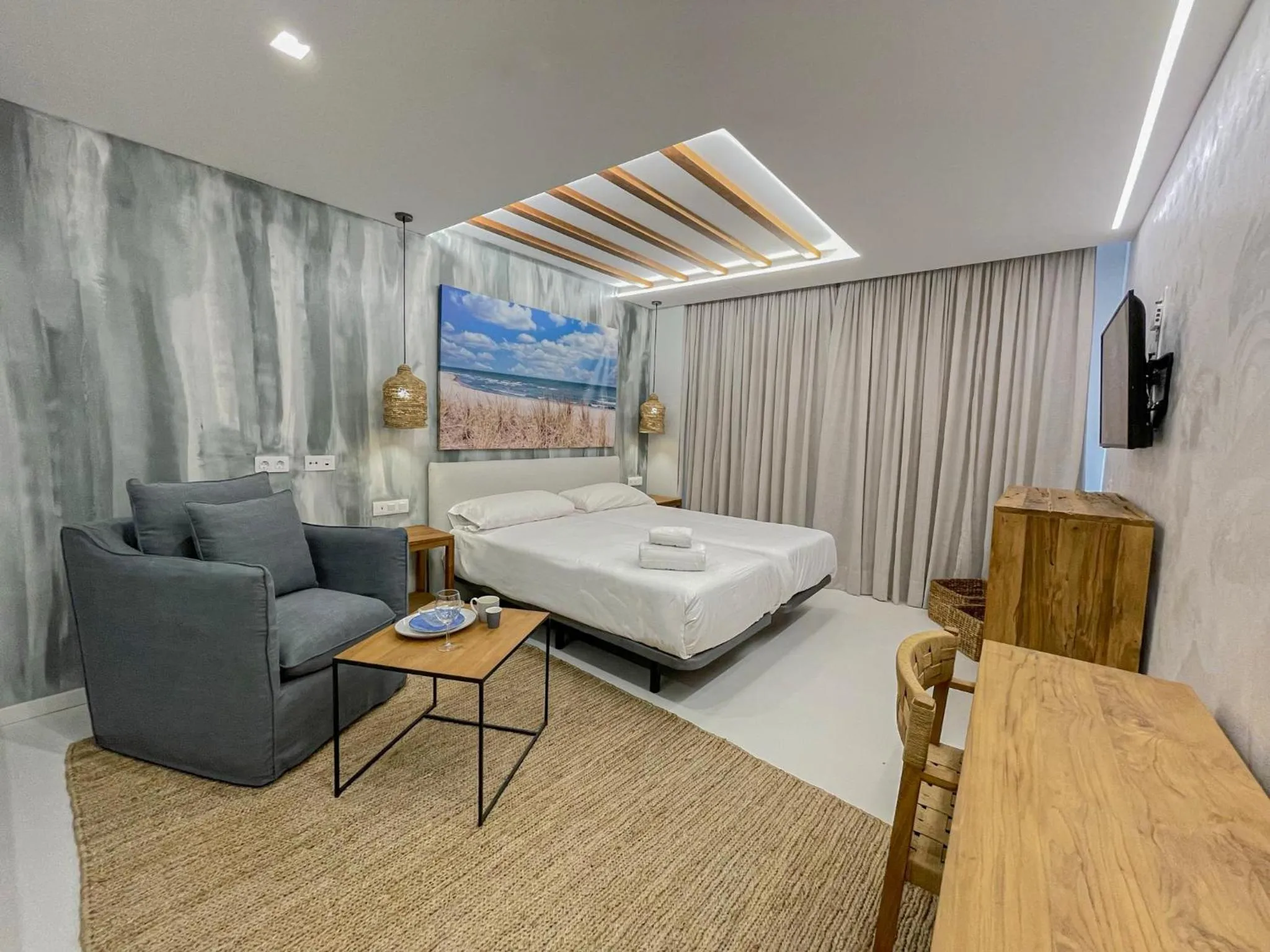 Bed in Gran Marina Suites