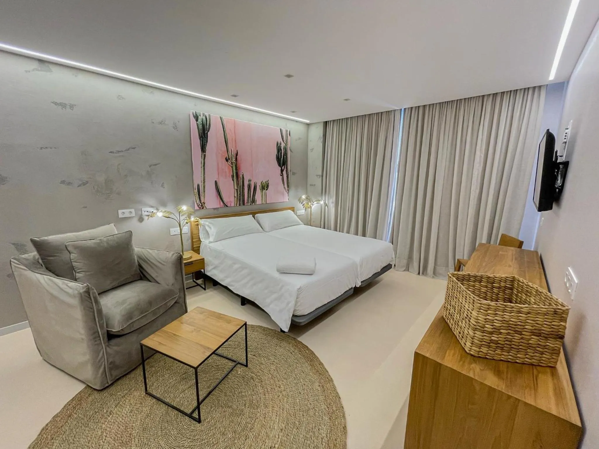 Bed in Gran Marina Suites