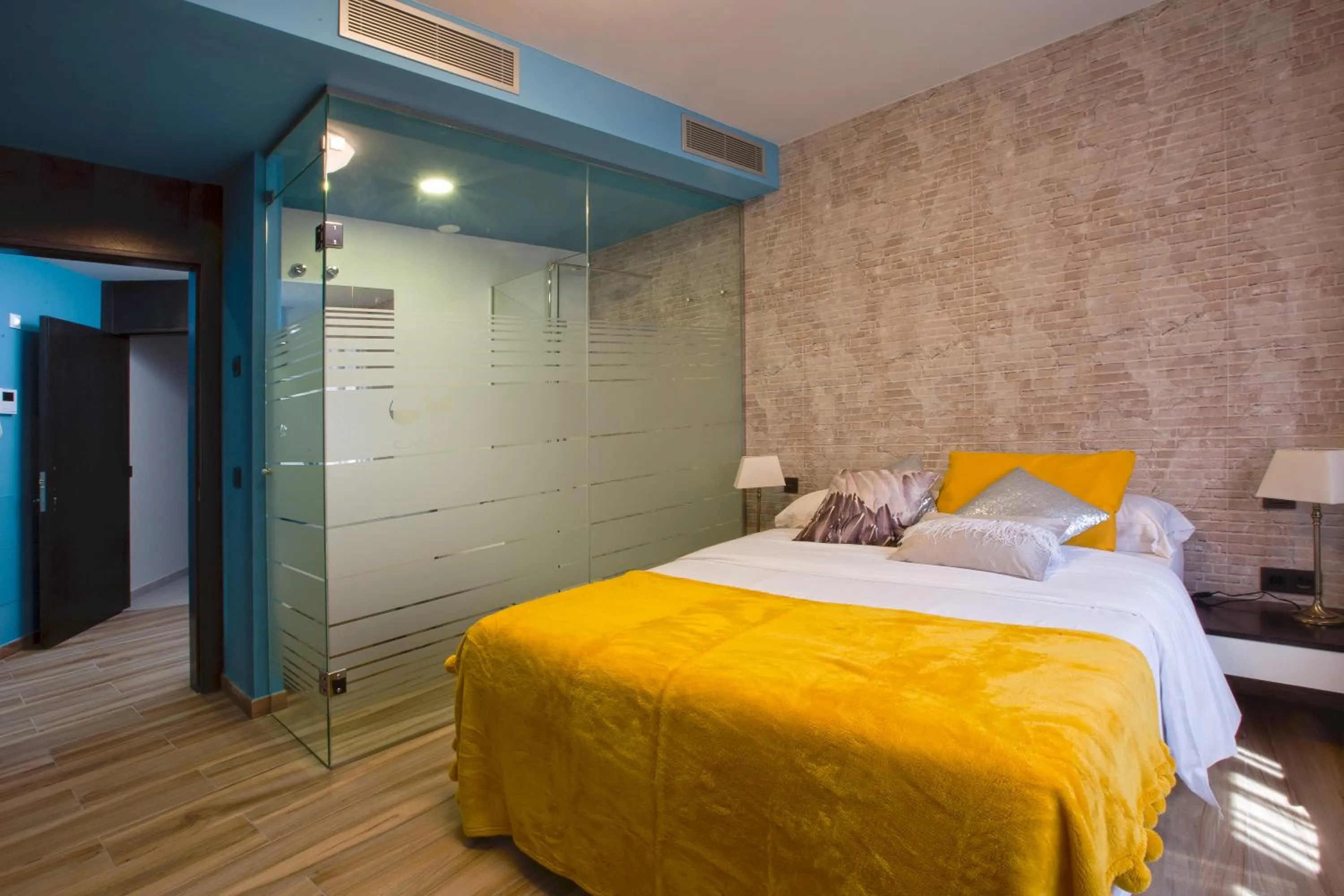 Bed in Gran Marina Suites