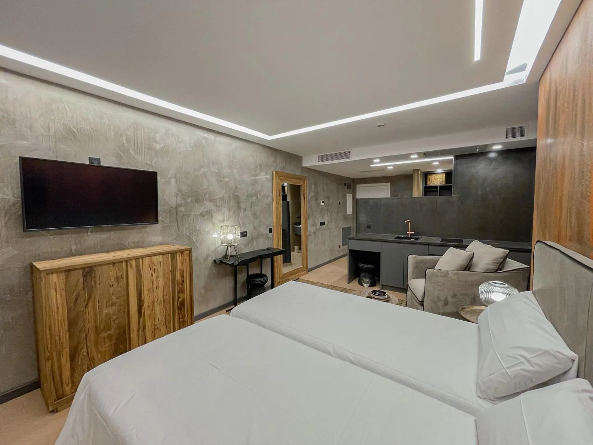 Bed in Gran Marina Suites