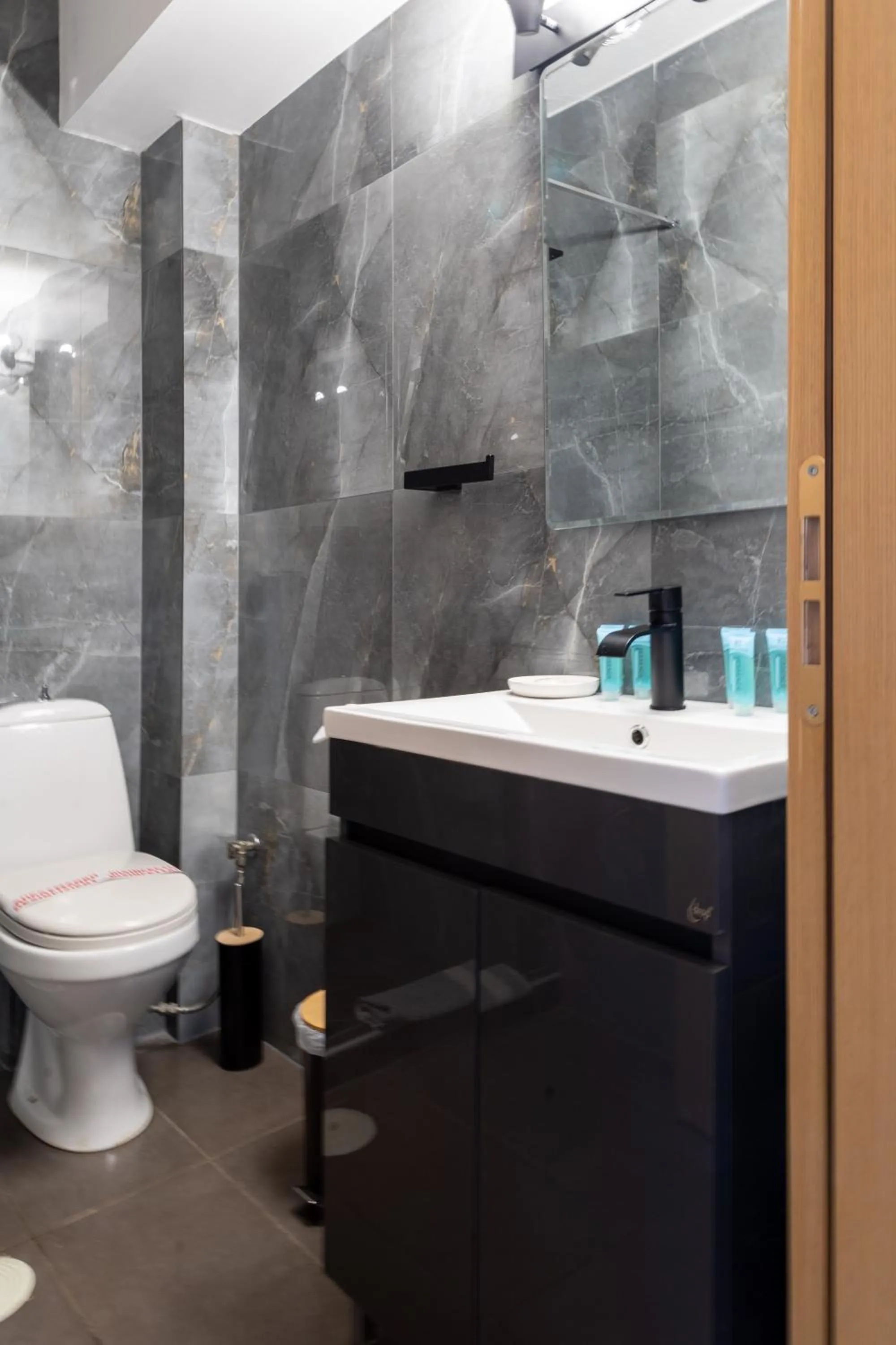 Toilet in Limani Comfort Rooms