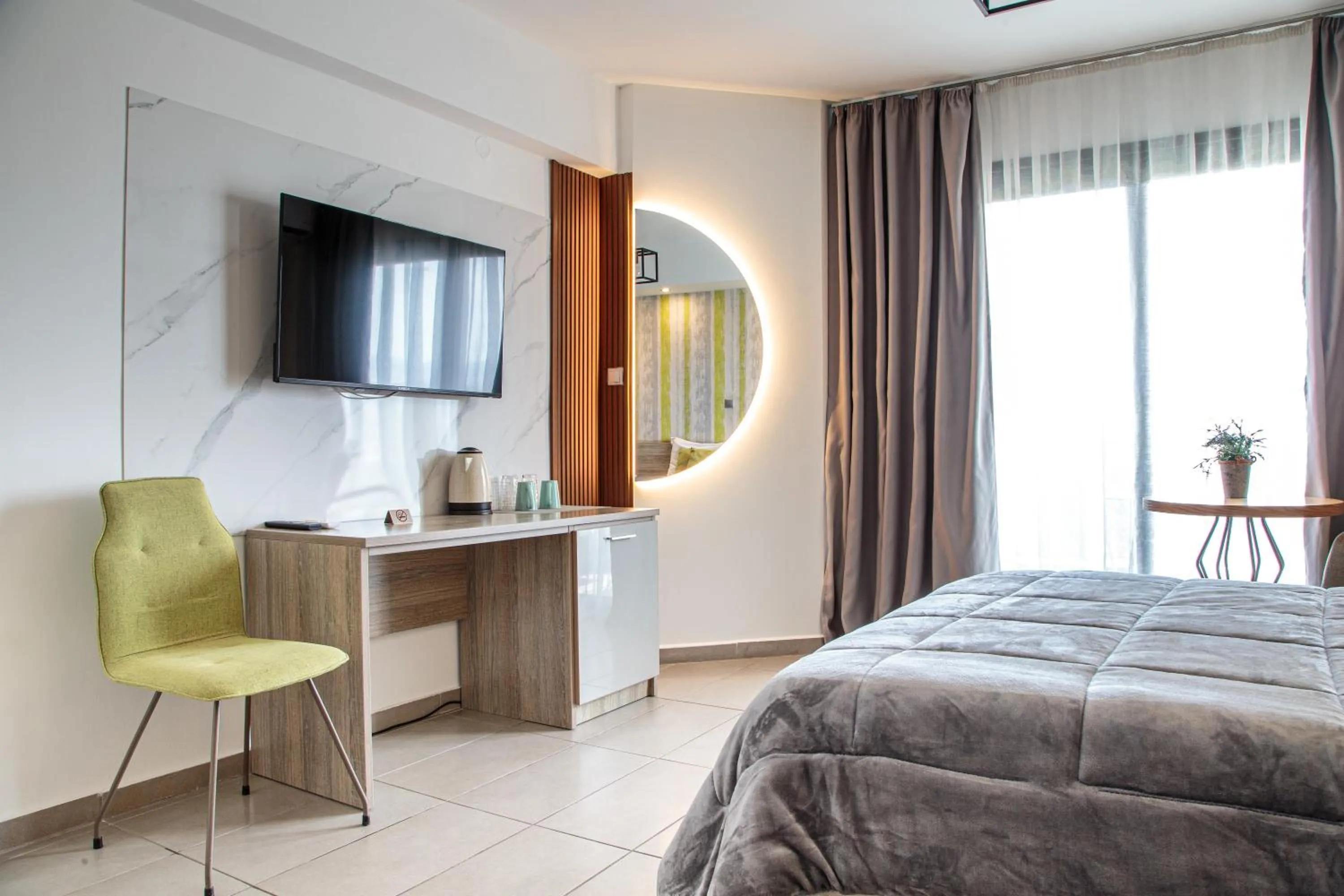 Bed in Limani Comfort Rooms