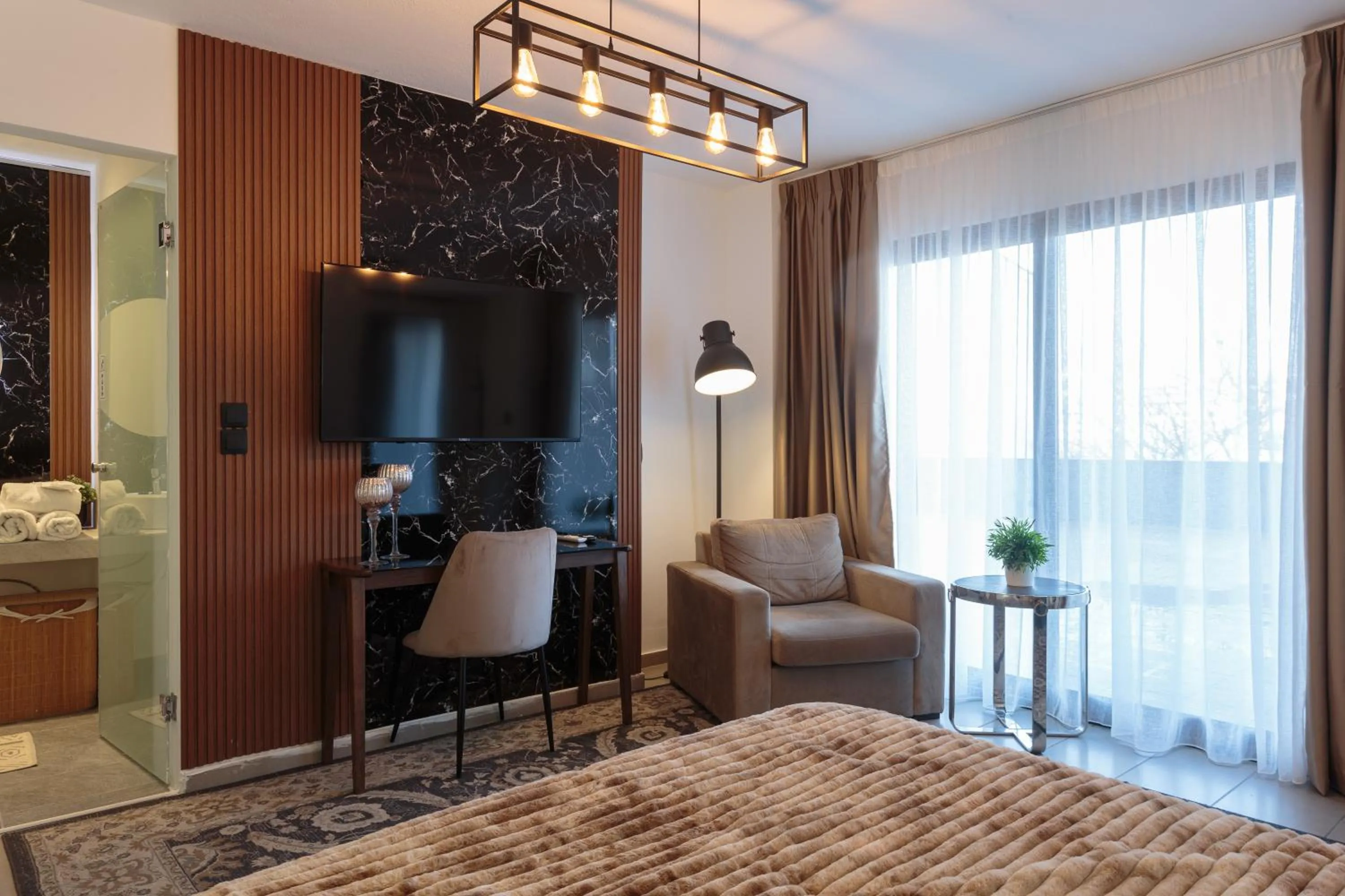 Bed in Limani Comfort Rooms