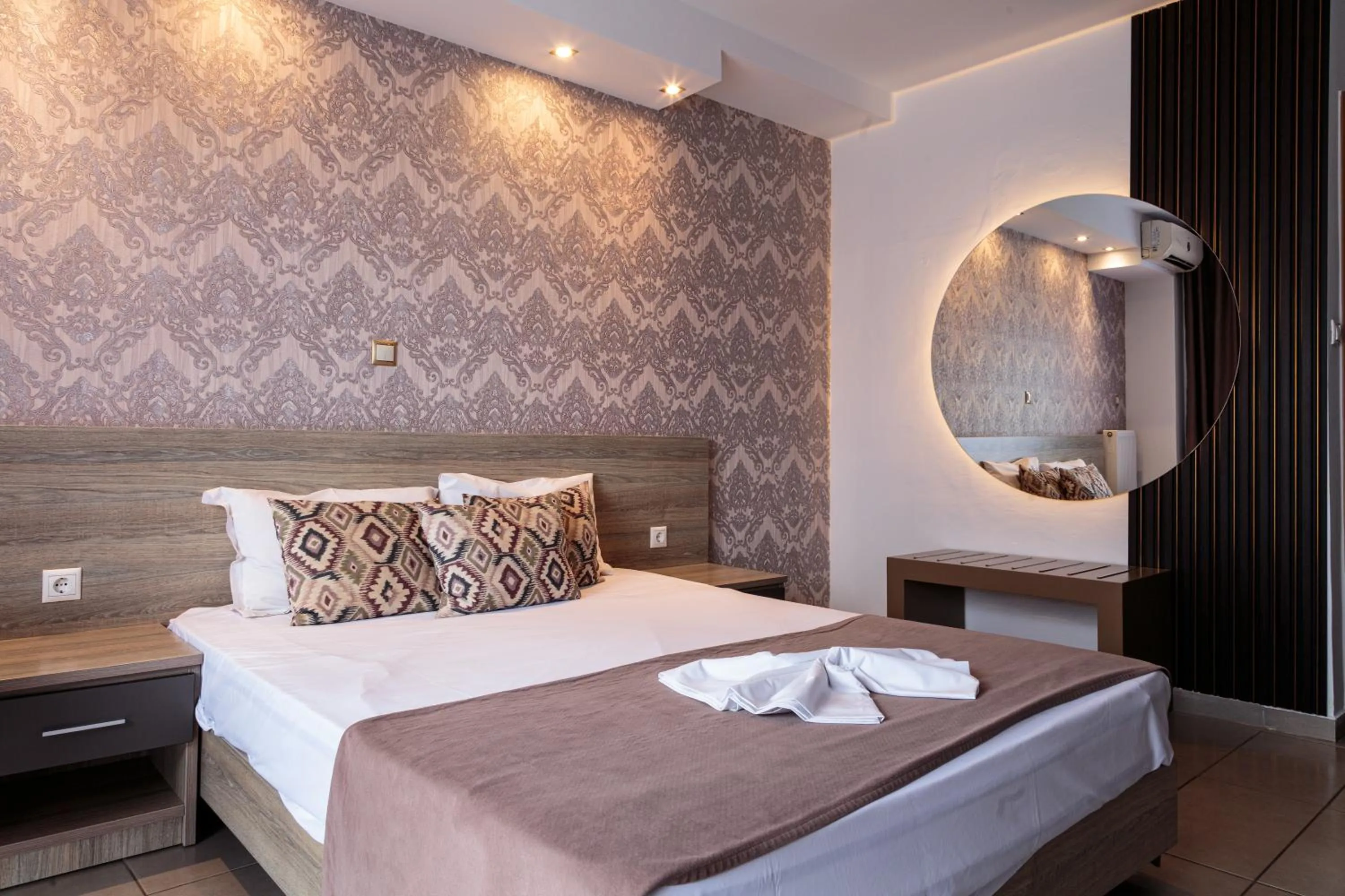 Bed in Limani Comfort Rooms