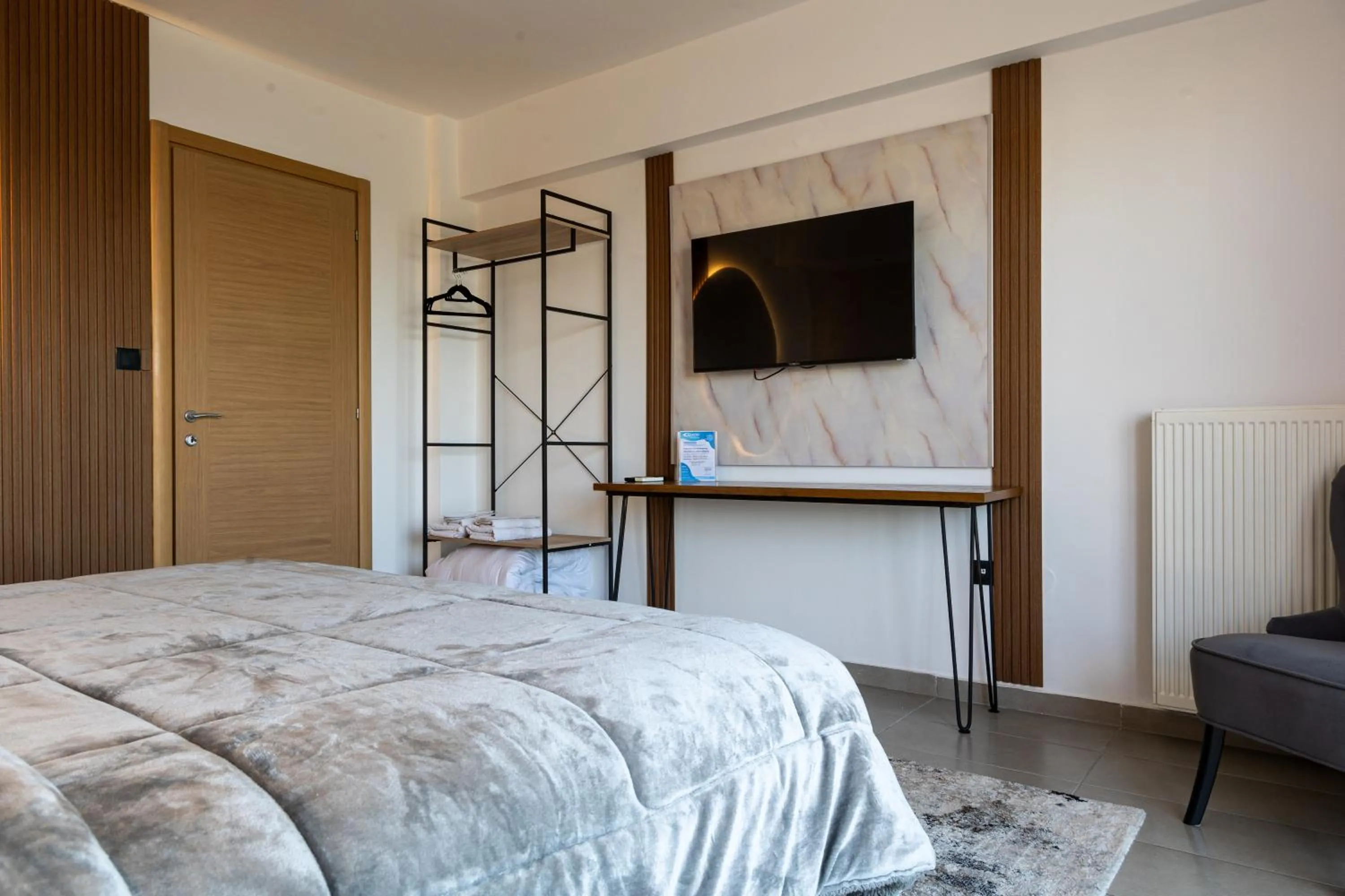 Bed in Limani Comfort Rooms