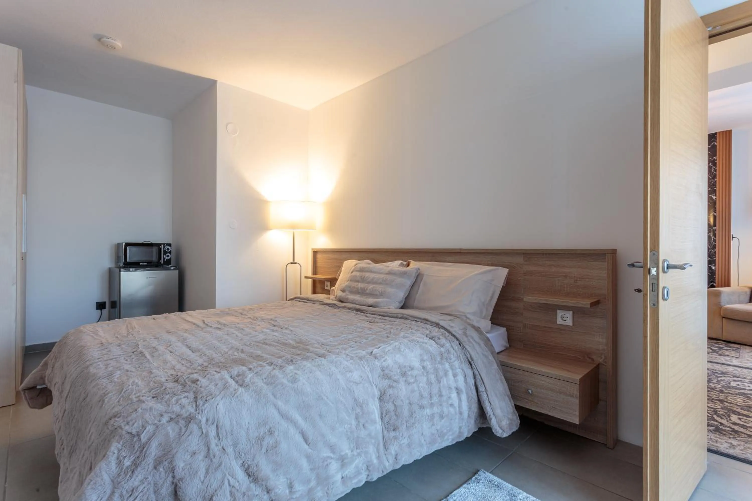 Bed in Limani Comfort Rooms