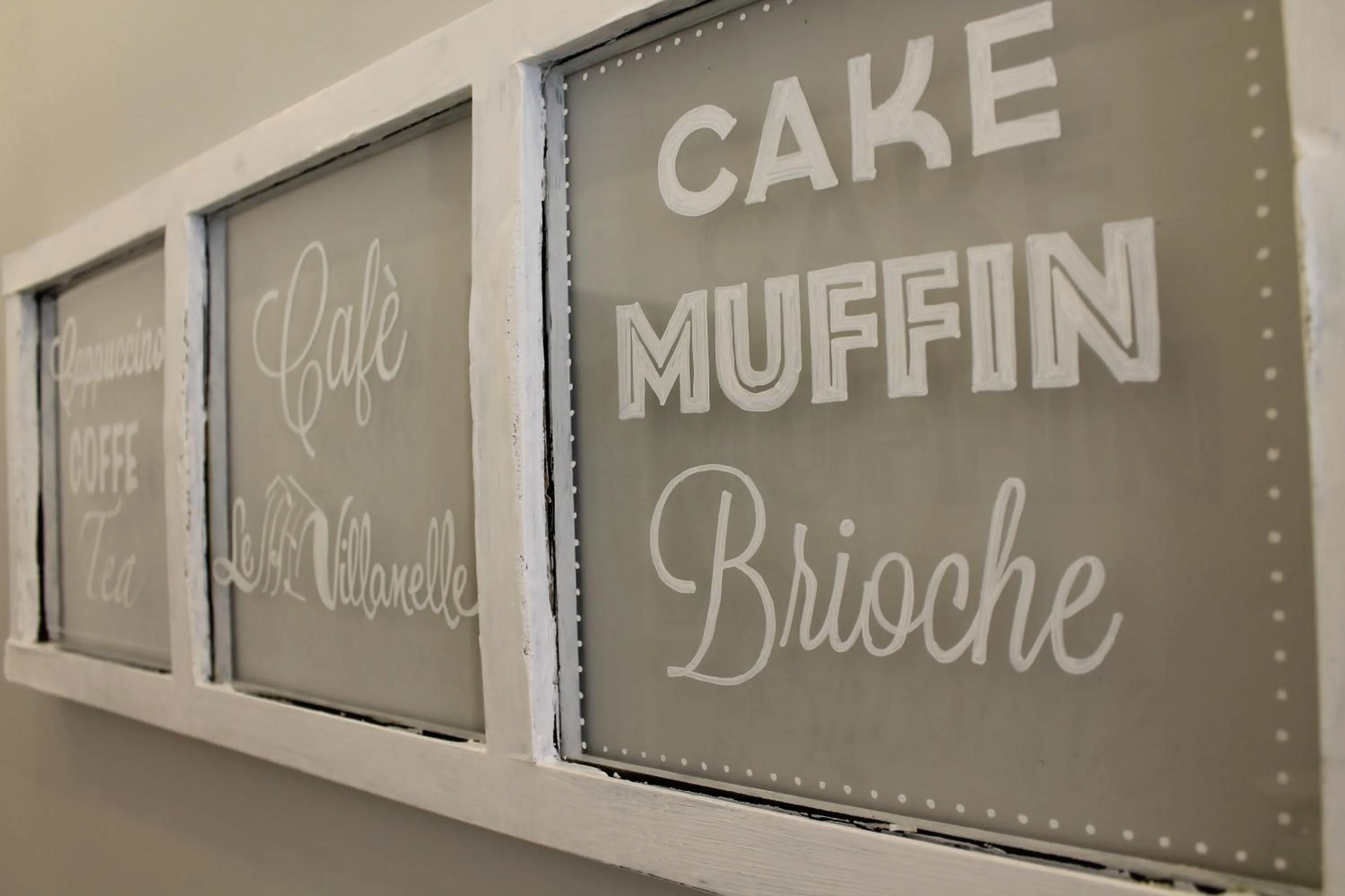 Logo/Certificate/Sign in Le Villanelle B&B