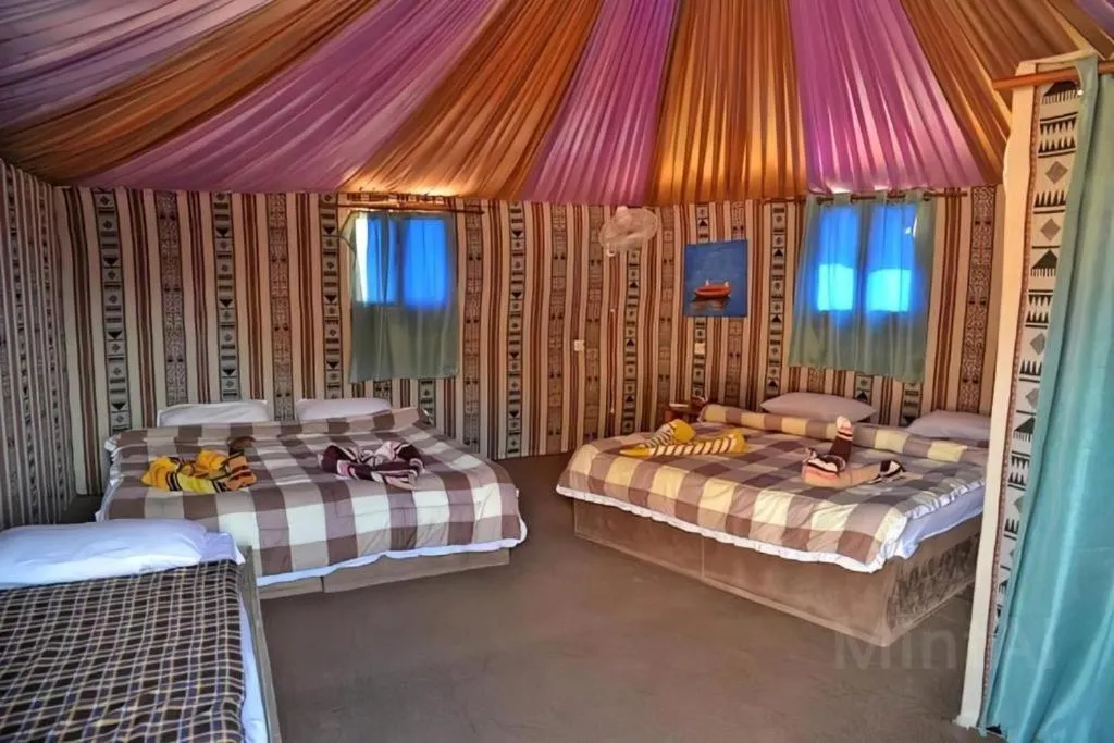 Bed in Hasan Zawaideh luxury camp 2
