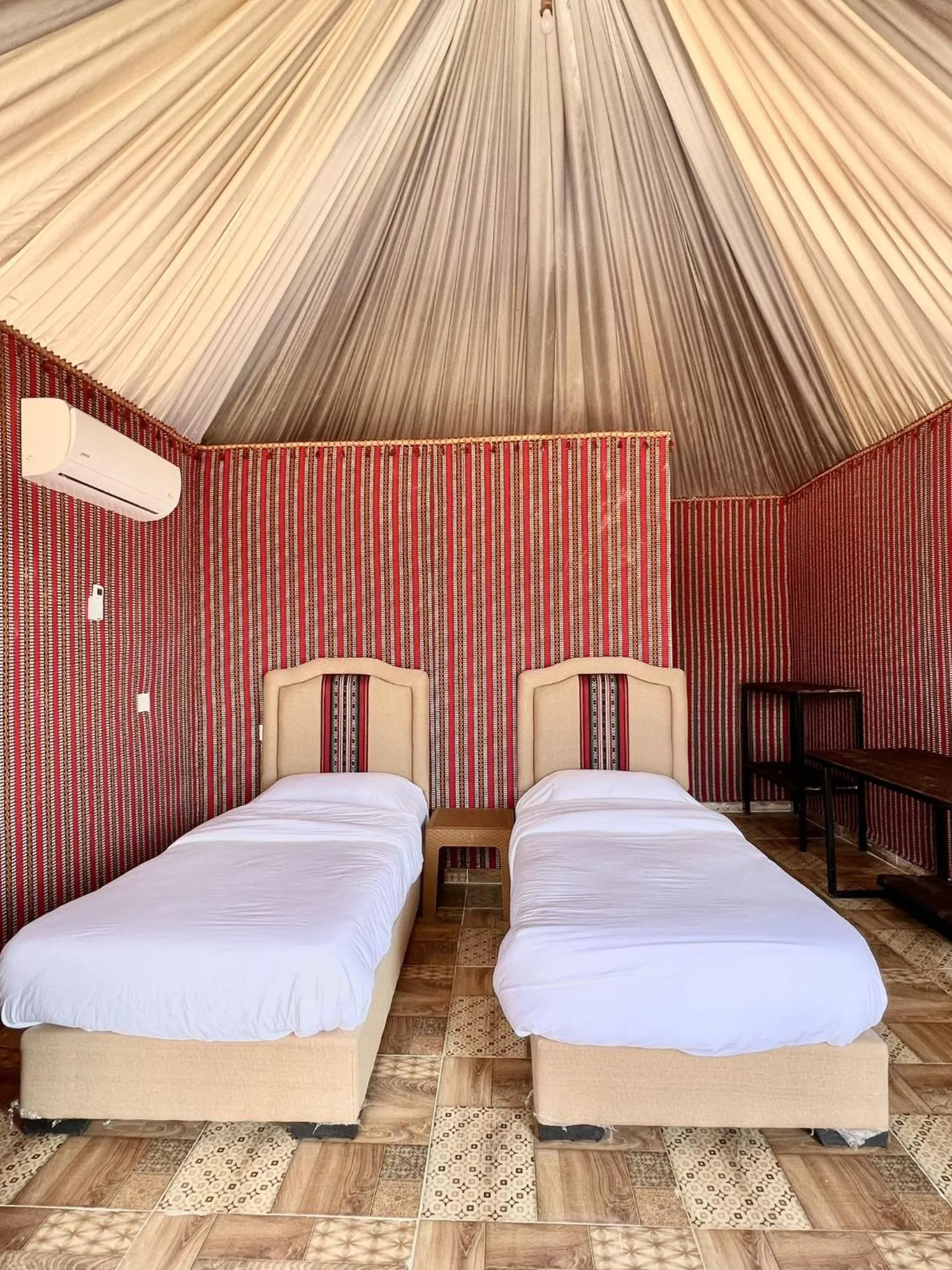 Bed in Hasan Zawaideh luxury camp 2