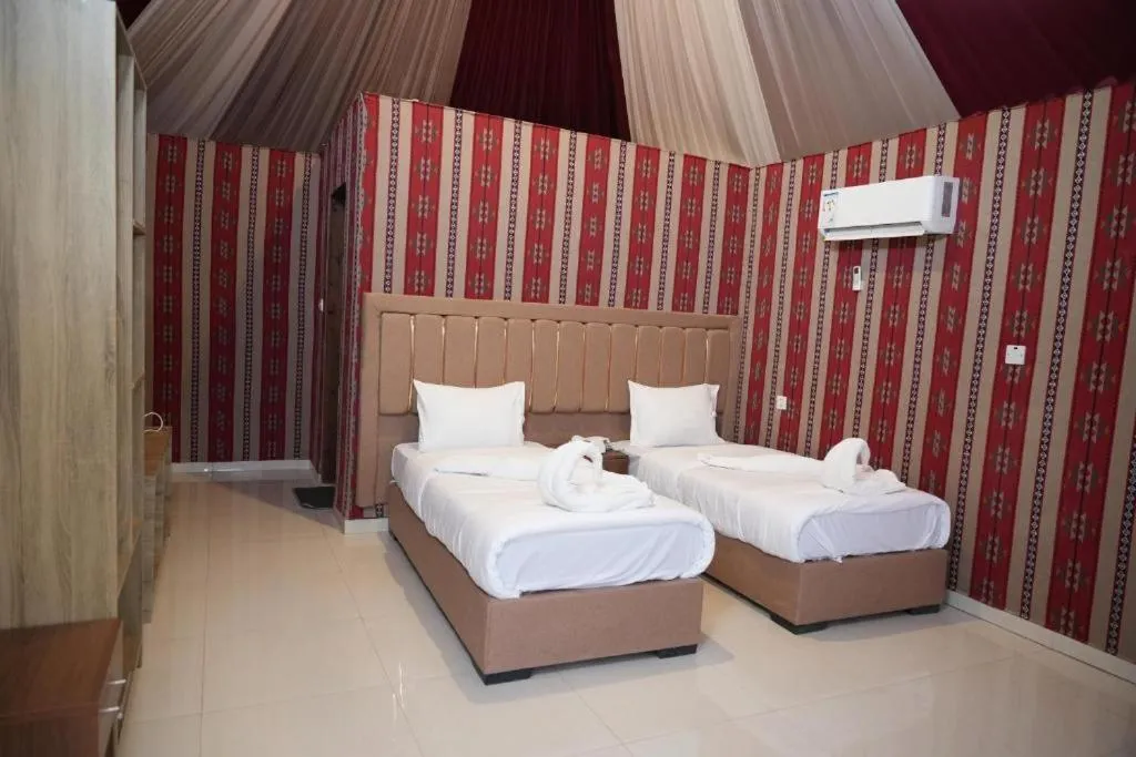 Bed in Hasan Zawaideh luxury camp 2