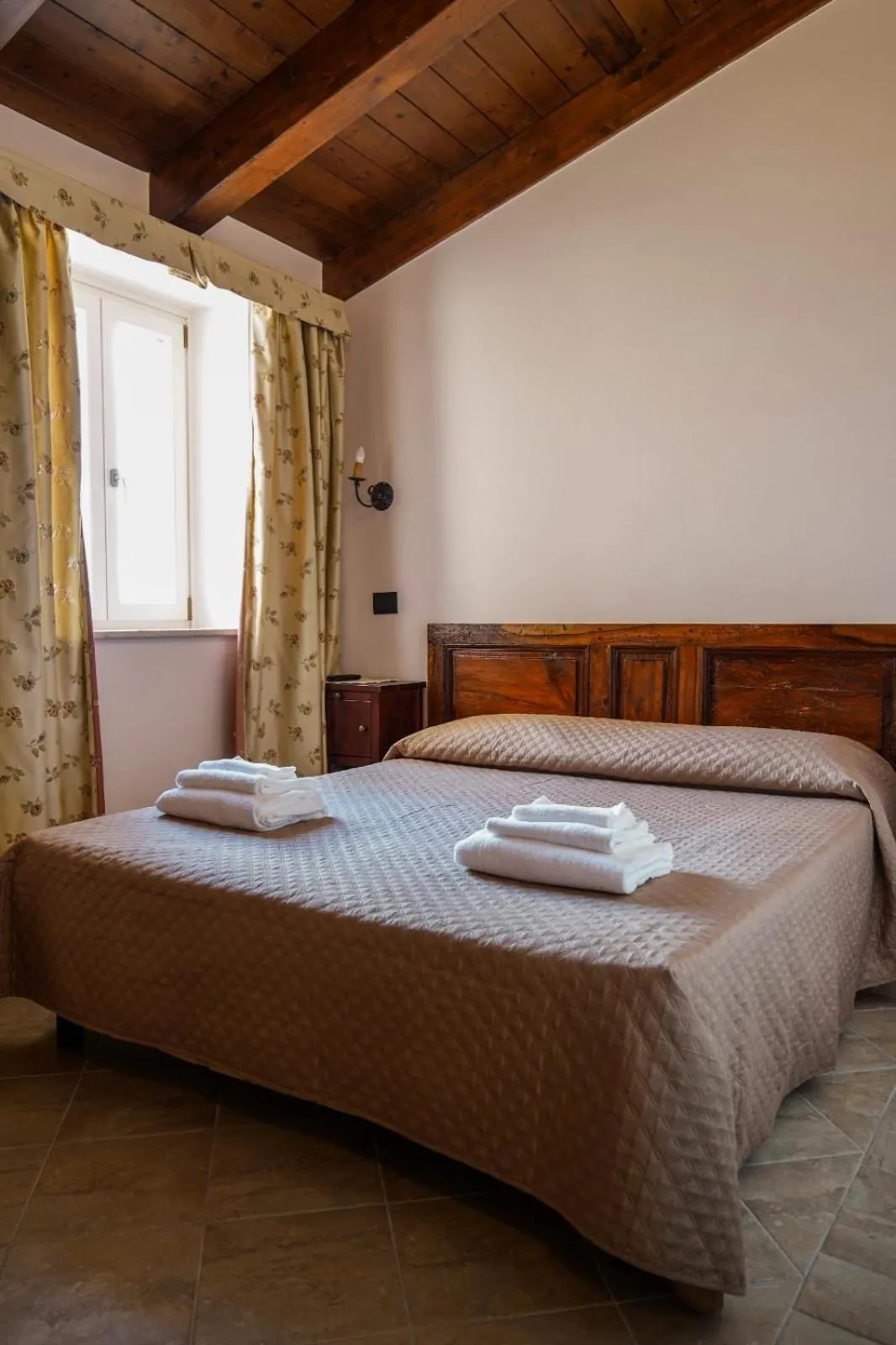 Bed in Palazzo Cestari Hotel