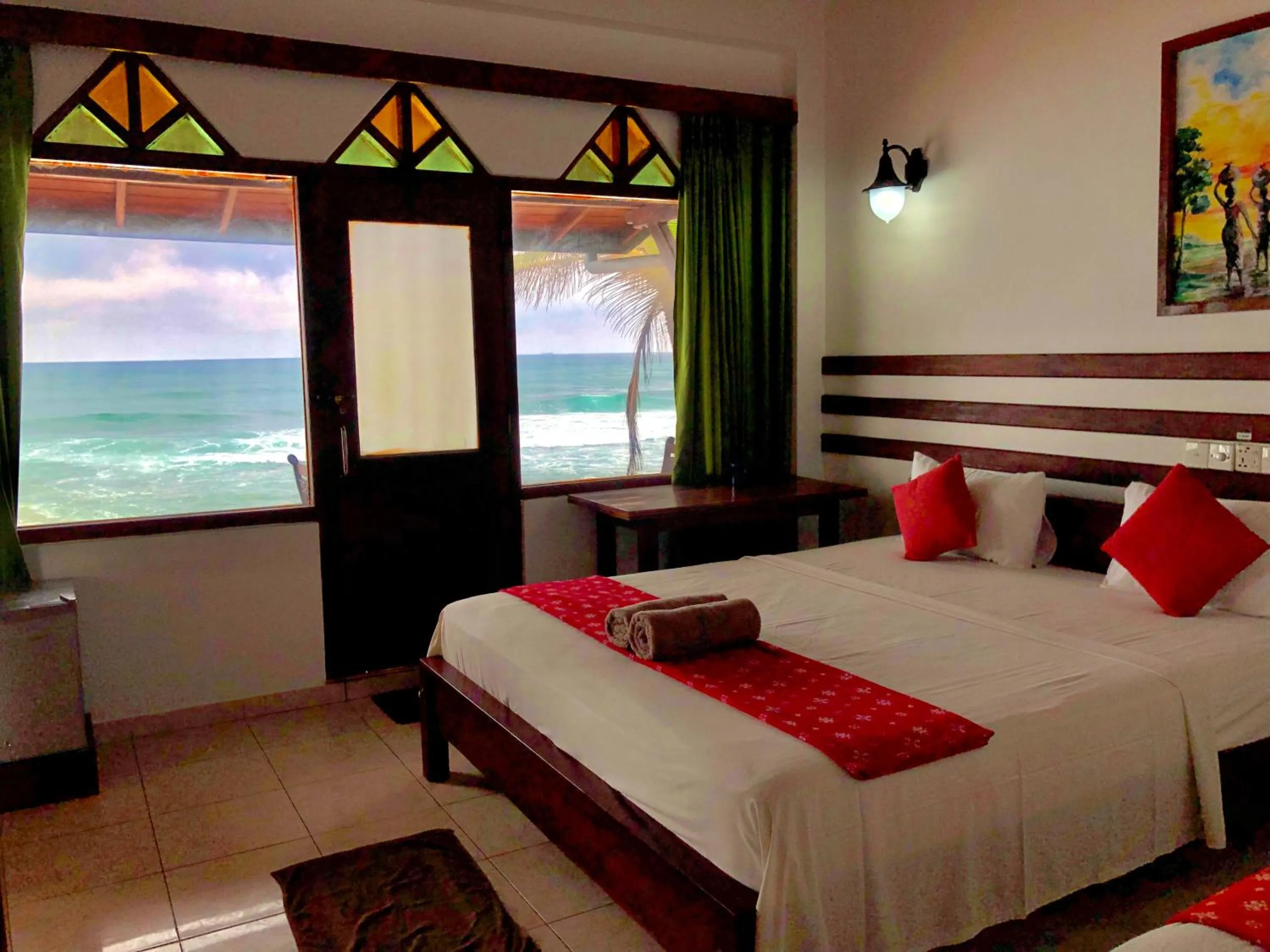 Bed in Drifters Hotel & Beach Restaurant