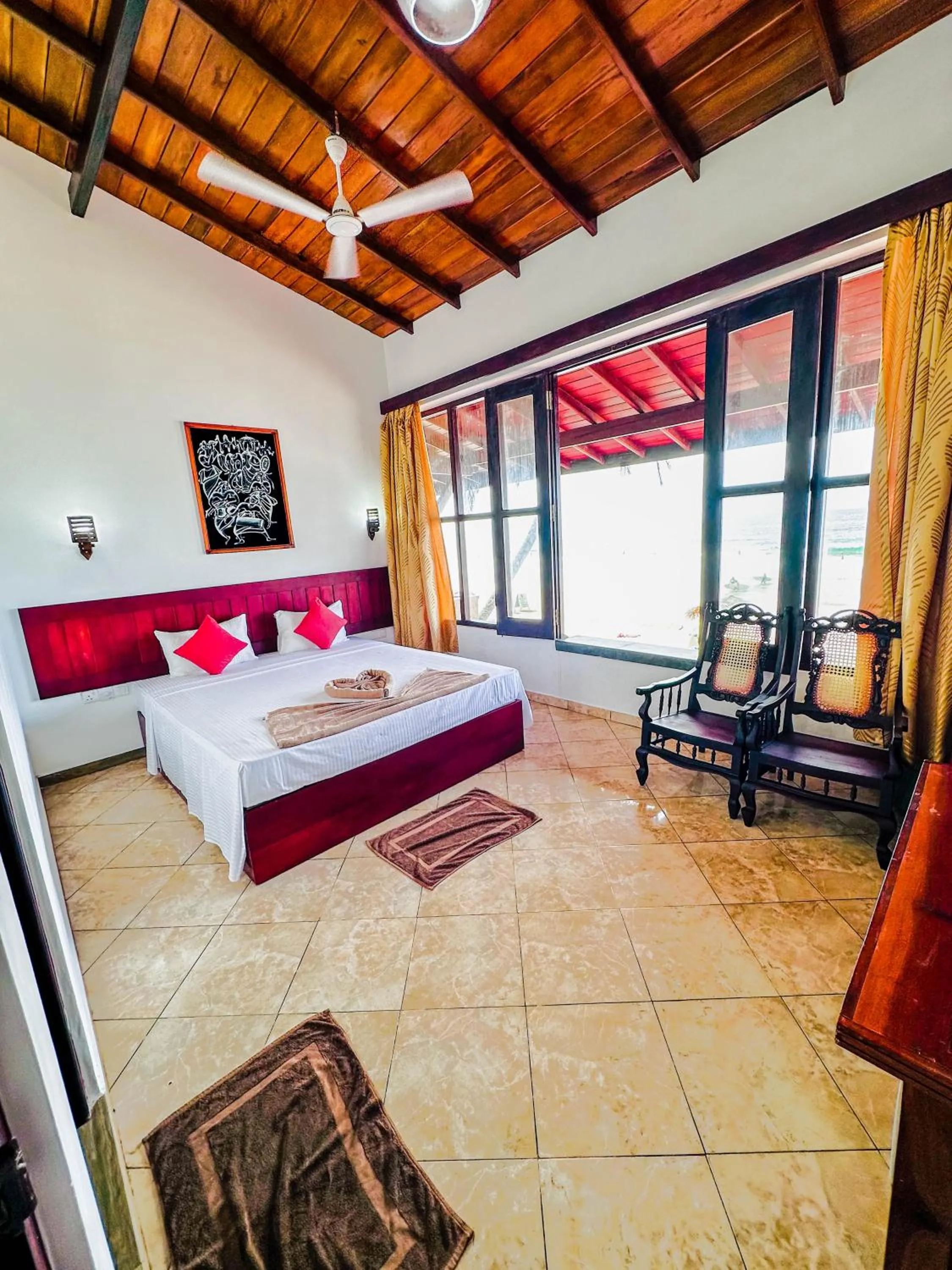 Bed in Drifters Hotel & Beach Restaurant