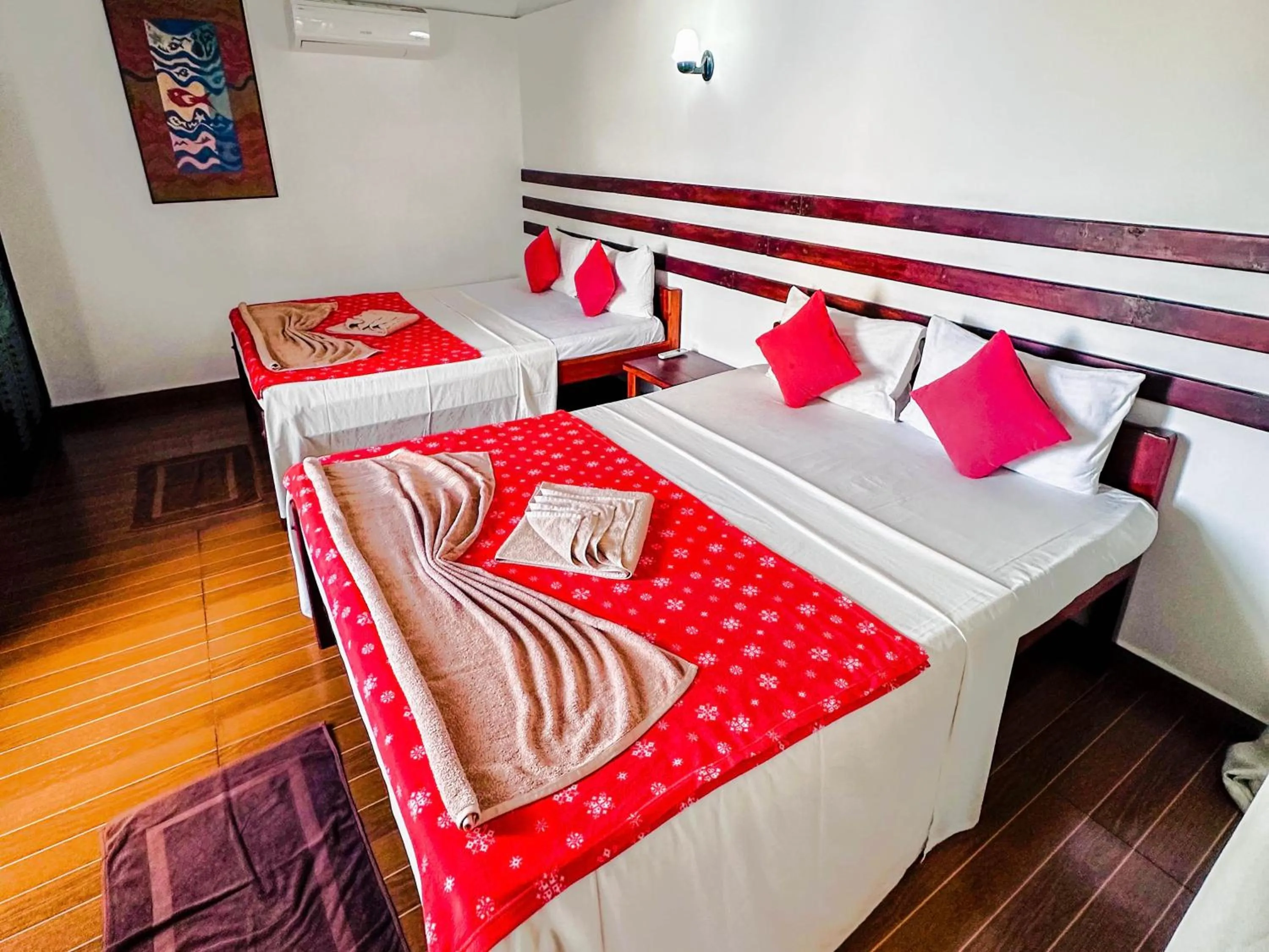 Bed in Drifters Hotel & Beach Restaurant