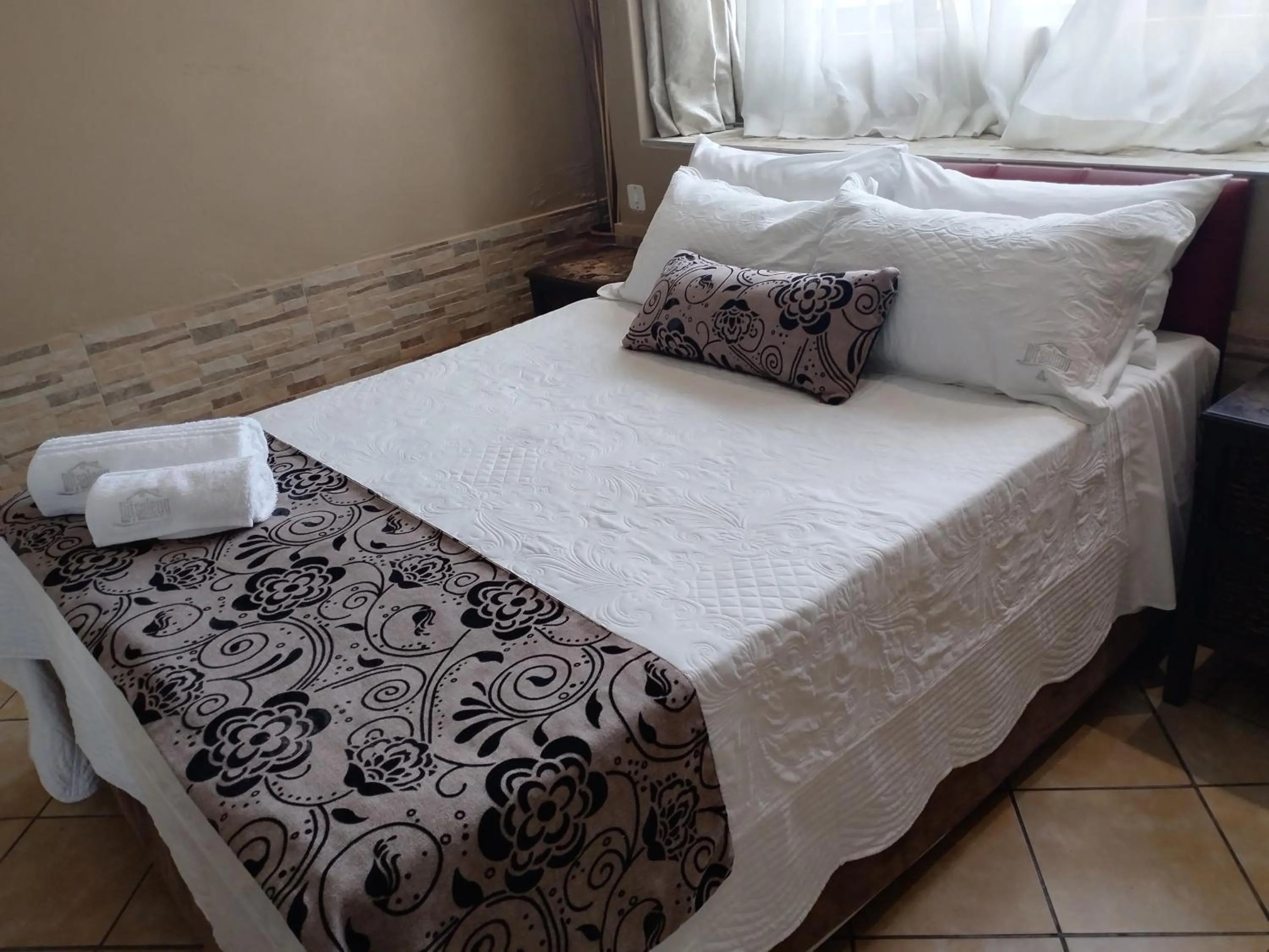 Bed in Ditsaleng Bed and Breakfast