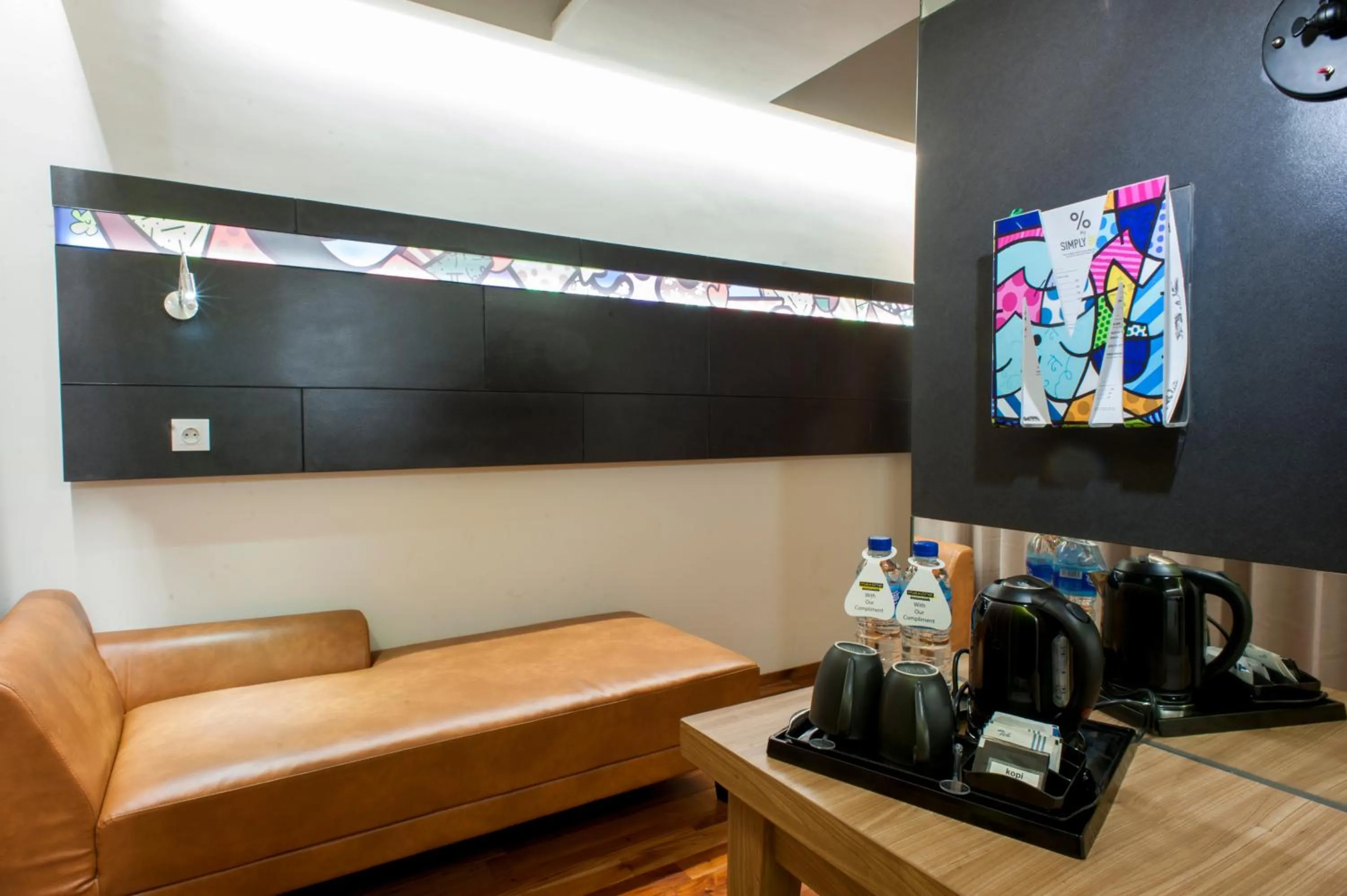 Living room in MaxOneHotels at Dharmahusada Surabaya