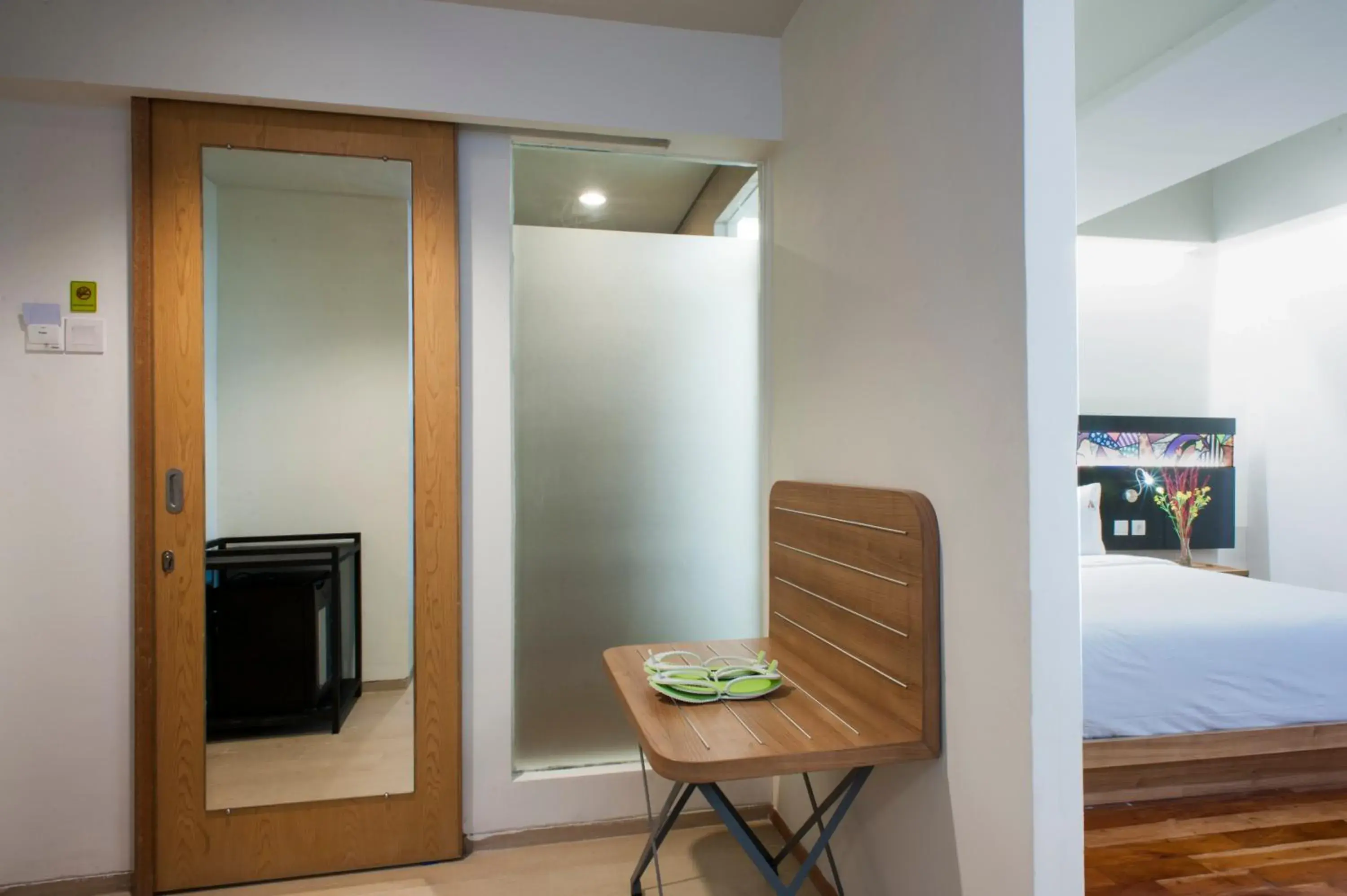 Junior Suite in MaxOneHotels at Dharmahusada Surabaya Junior Suite in MaxOneHotels at Dharmahusada Surabaya