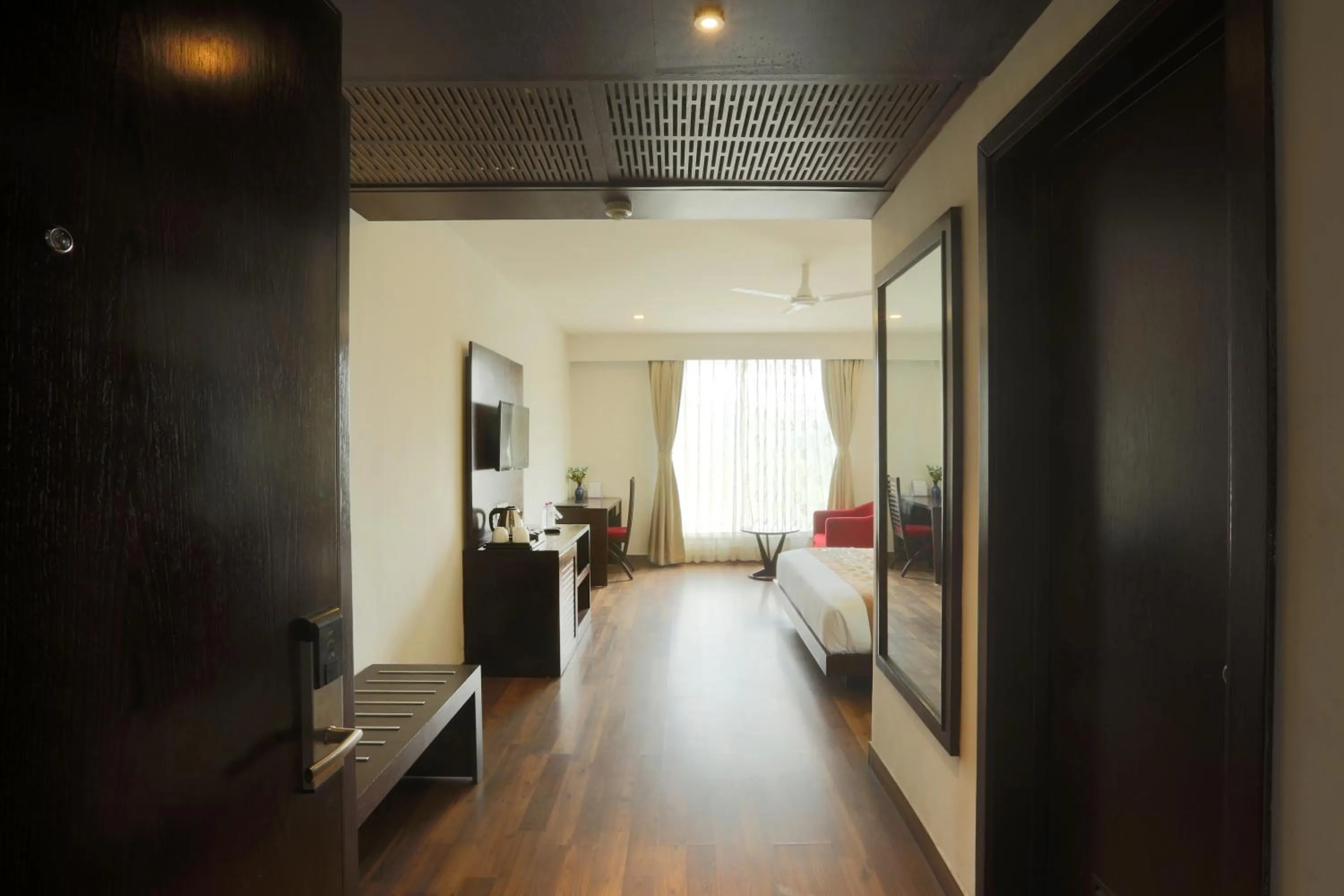 Communal lounge/ TV room, Bed in Hotel Mumbai House