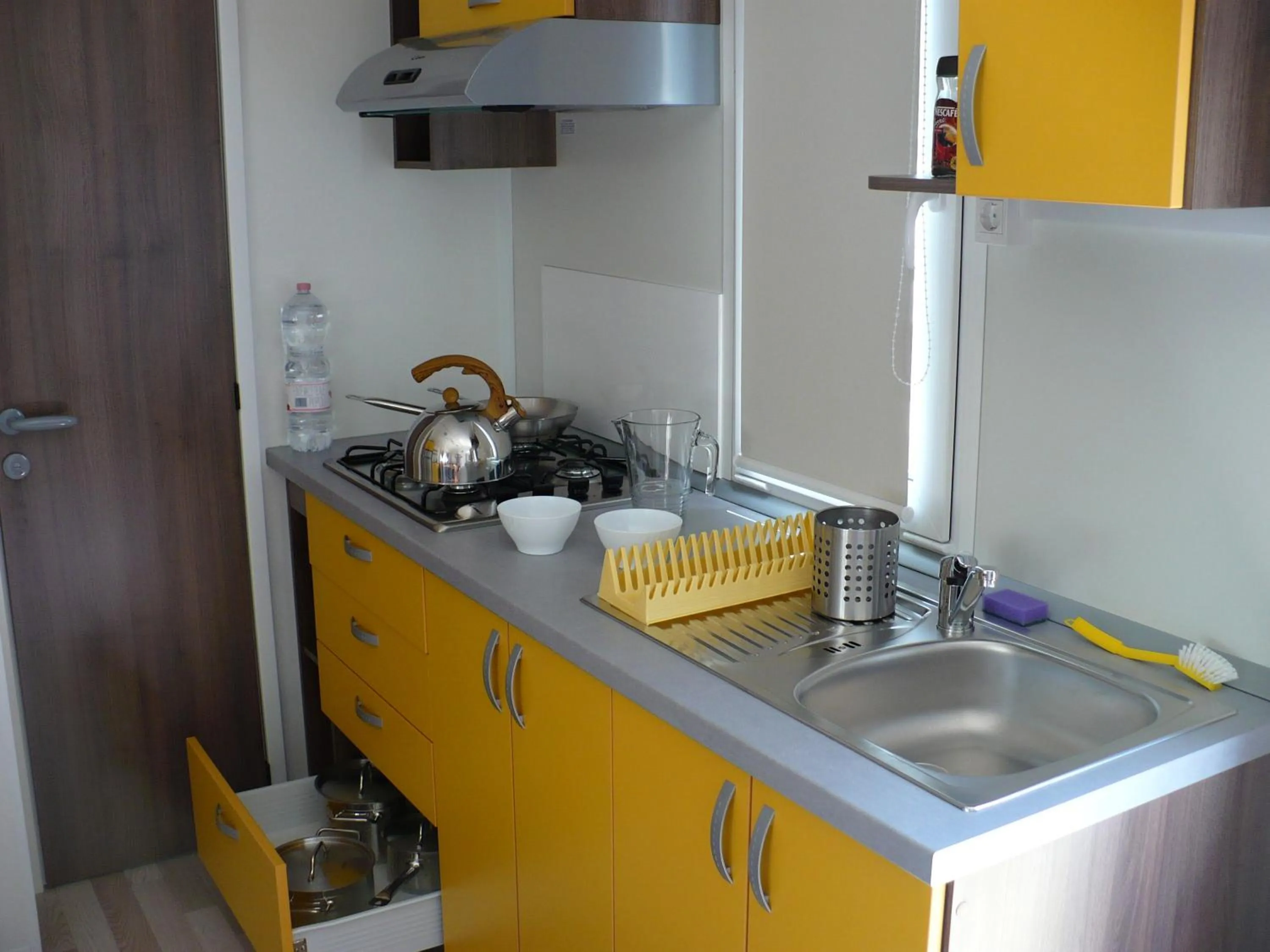 Kitchen or kitchenette in Mobilhome Victoria Camping Lanterna