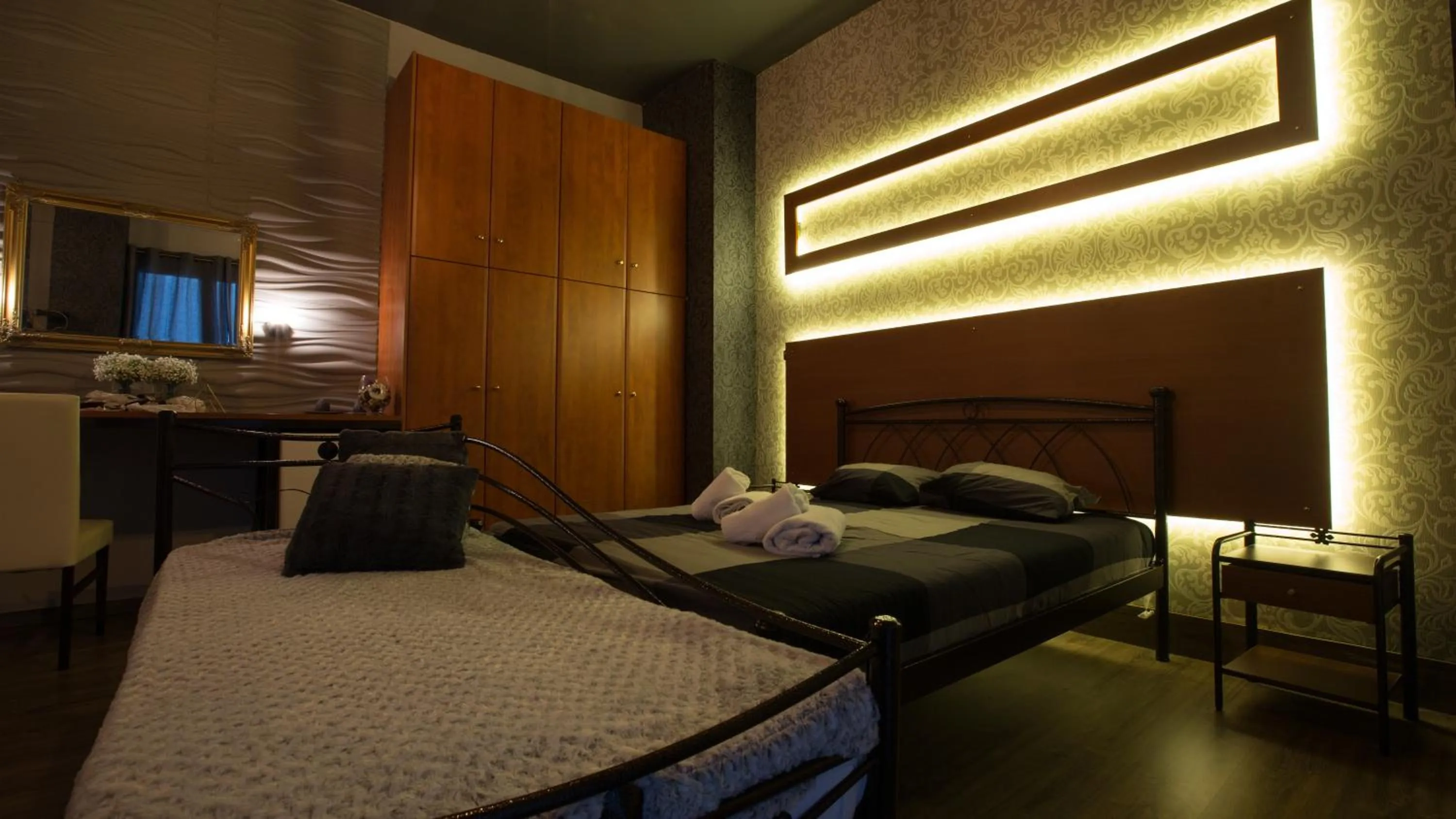 Bed in Cavallari Palace Hotel Suites